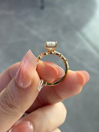 For Emma 14k yellow 2ct radiant E/vvs2 with 0.464ct side stones