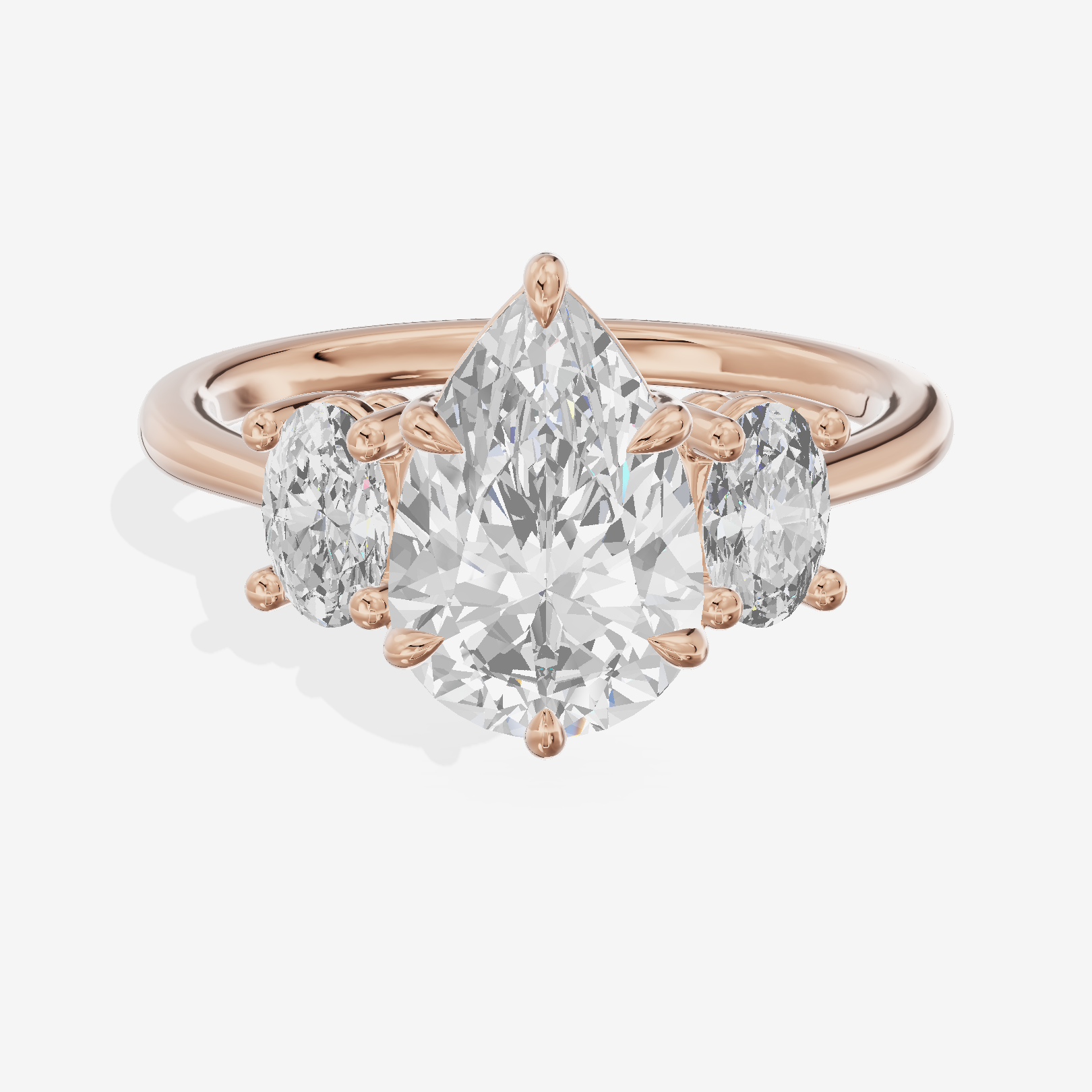Modern Coeurine Three Stone Pear Engagement Ring (1/2 ct. tw.) in 18K Rose Gold