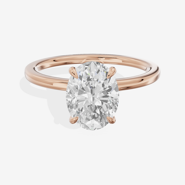 Sincere Halo Oval Engagement Ring (1/15 ct. tw.) in 14K Rose Gold