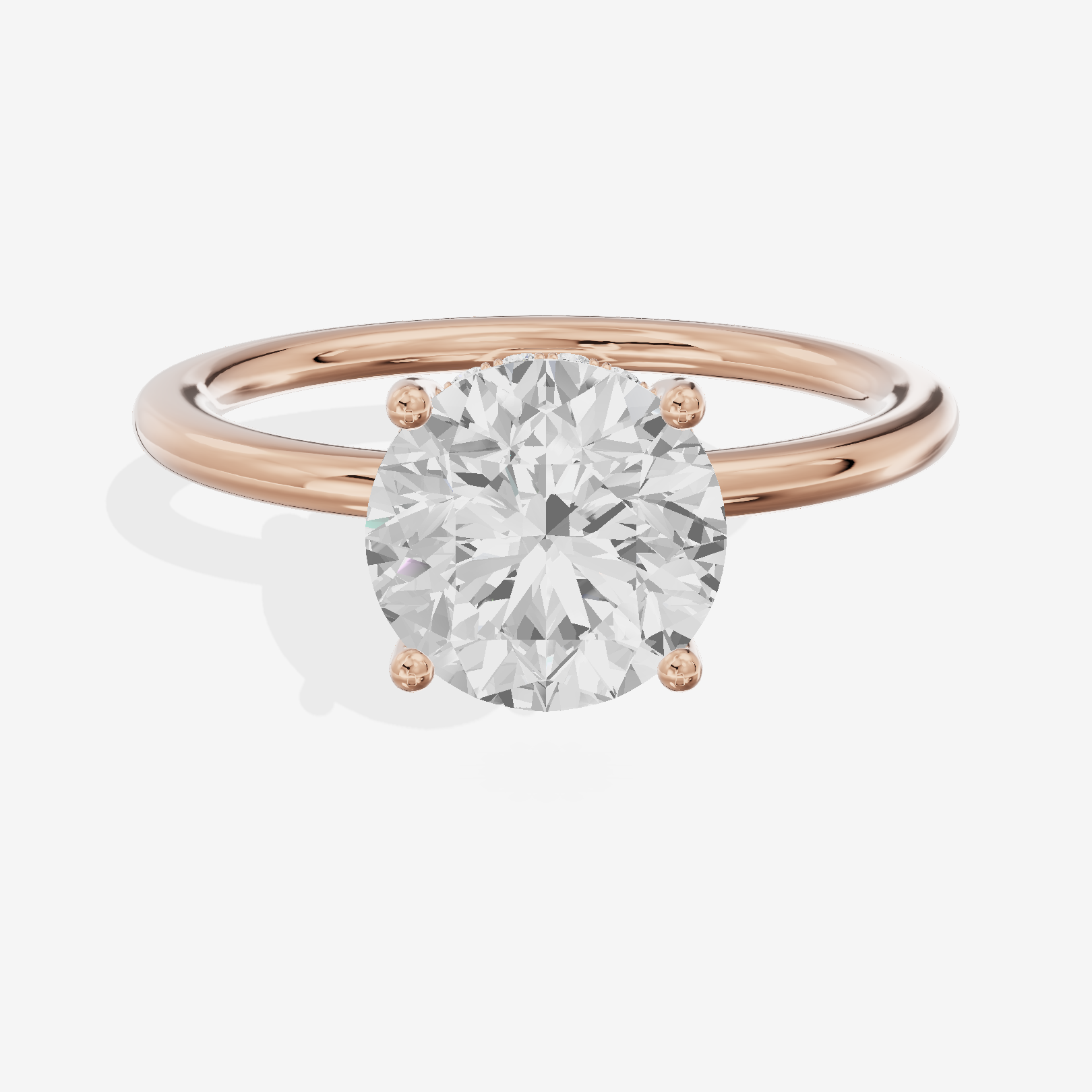 Reverya Hidden Halo Round Engagement Ring (1/20 ct. tw.) in 18K Rose Gold