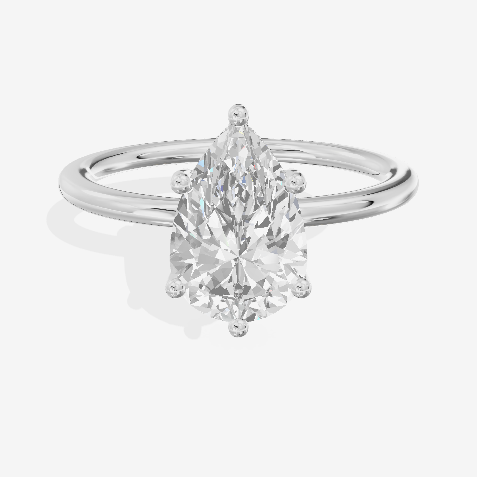 Reverya Hidden Halo Pear Engagement Ring (1/20 ct. tw.) in 18K White Gold
