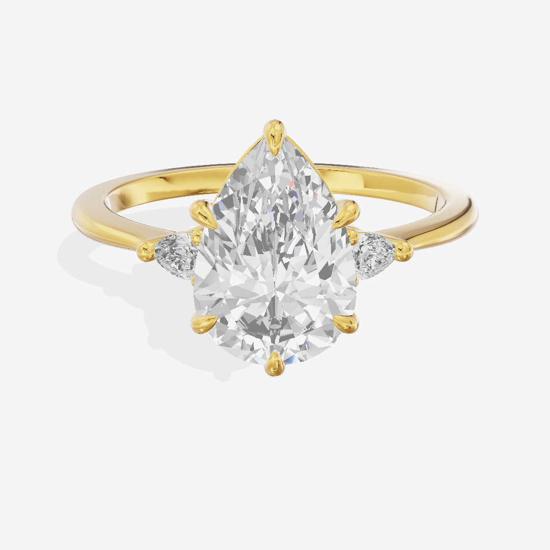 Coeurine Three Stone Pear Engagement Ring (1/8 ct. tw.) in 18K Yellow Gold