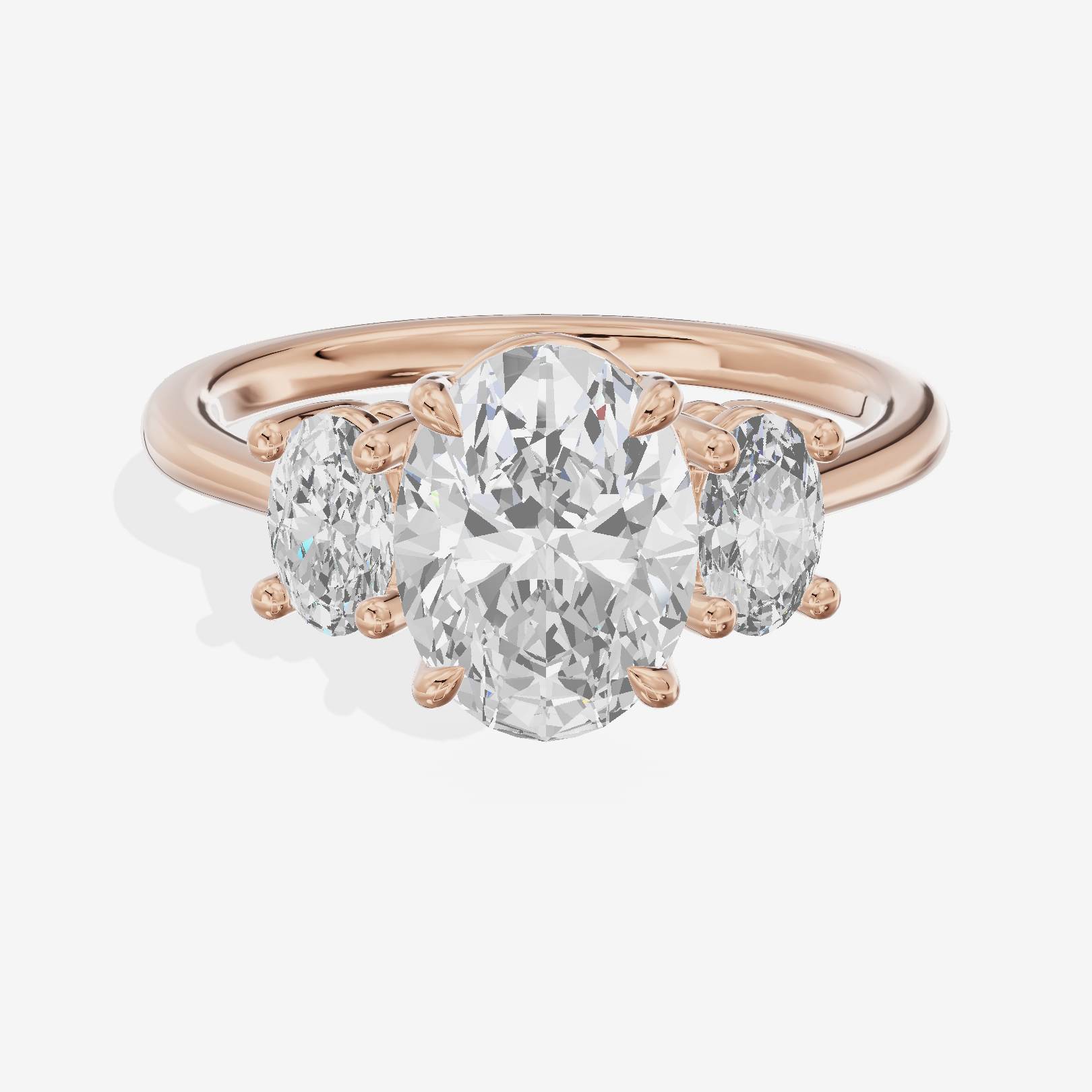 Modern Coeurine Three Stone Oval Engagement Ring (1/2 ct. tw.) in 18K Rose Gold