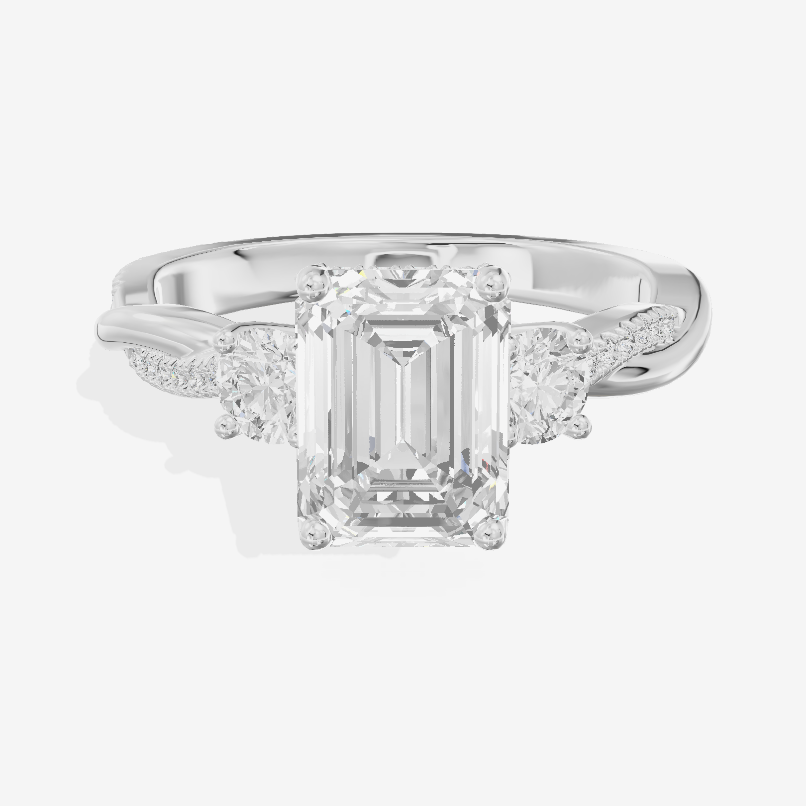 Promezza Three Stone Emerald Engagement Ring (1/10 ct. tw.) in Platinum