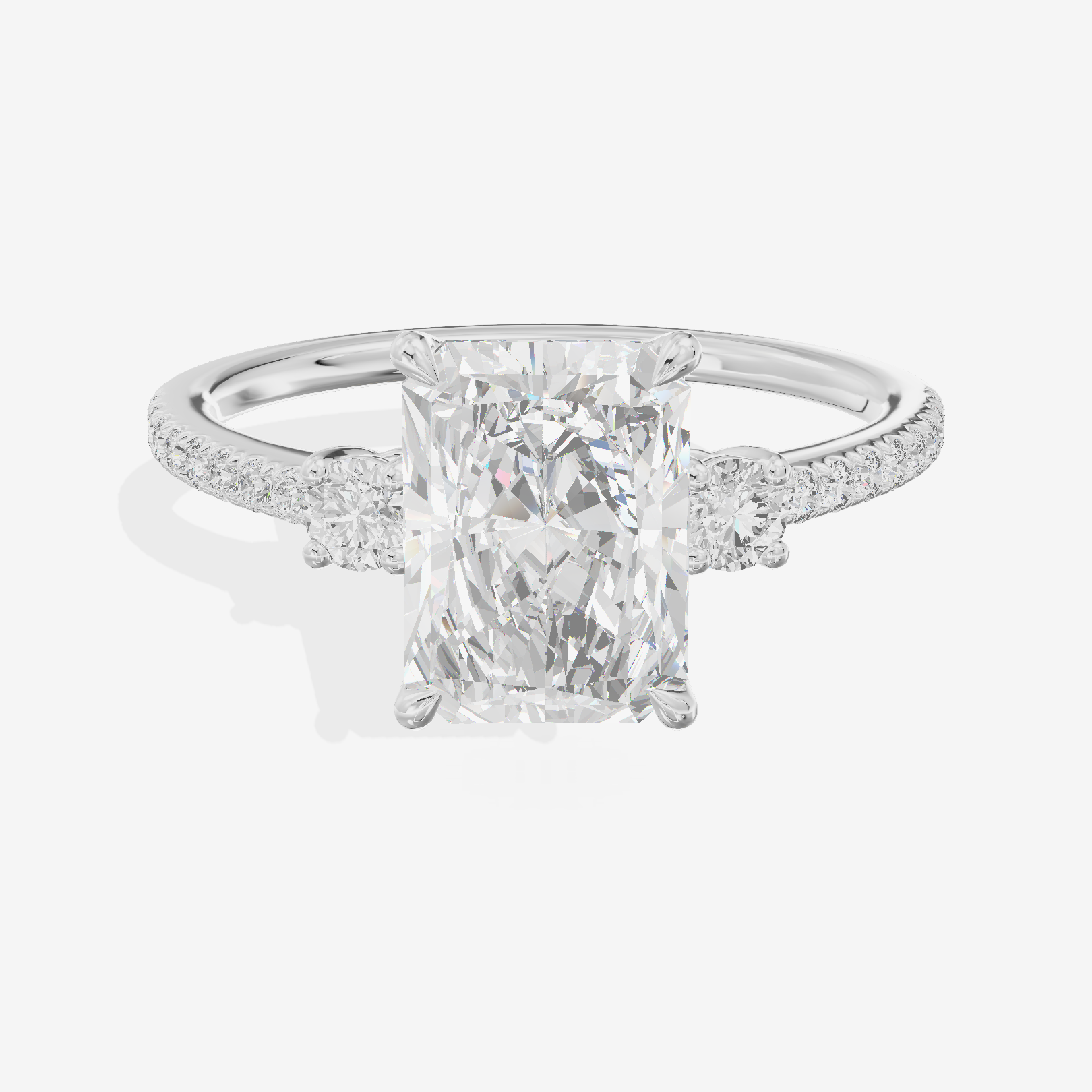 Mirth Three Stone Radiant Engagement Ring (1/4 ct. tw.) in Platinum