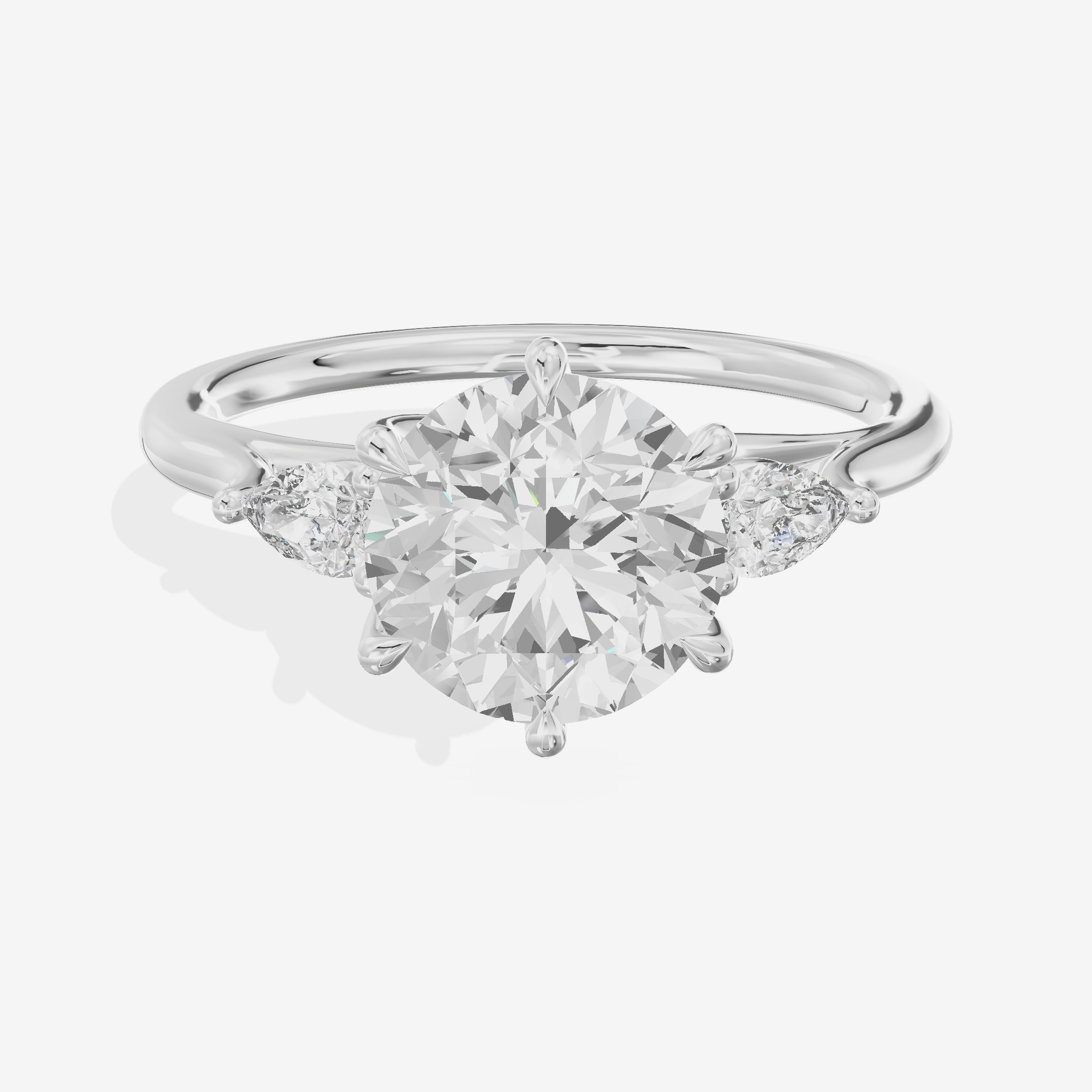 Classic Belovae Round Three Stone Engagement Ring (1/5 ct. tw.) in 18K White Gold
