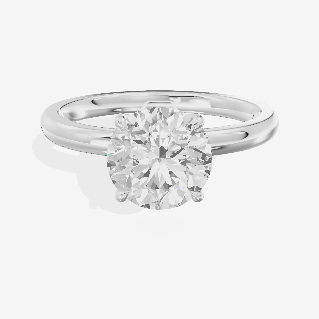 Petite Tender 2mm Round Solitaire Engagement Ring in Platinum
