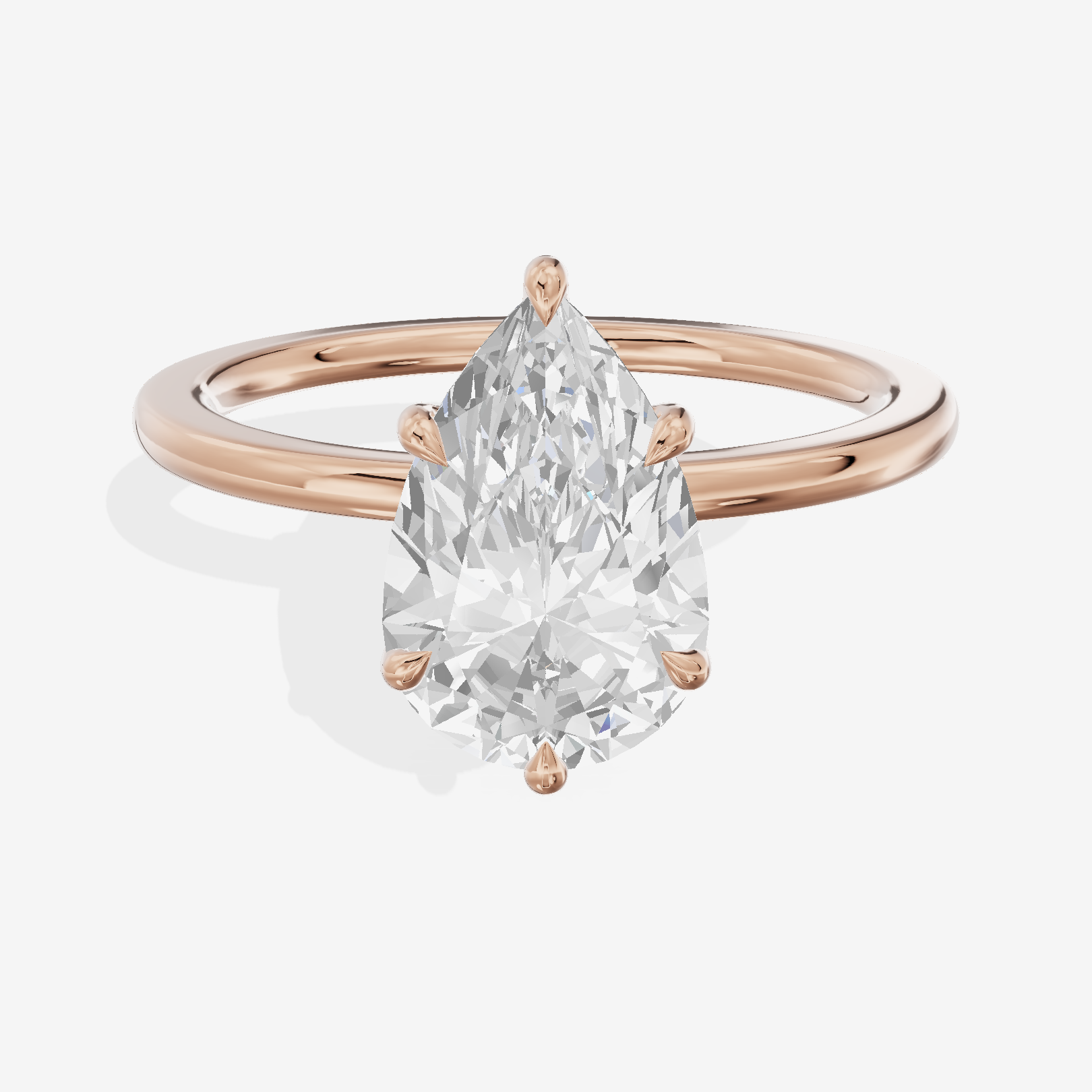 Coeurine Hidden Halo Pear Engagement Ring (1/20 ct. tw.) in 18K Rose Gold