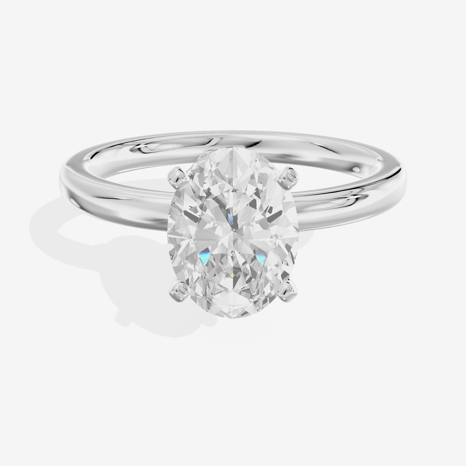 Sincere 2mm Oval Solitaire Engagement Ring in 18K White Gold