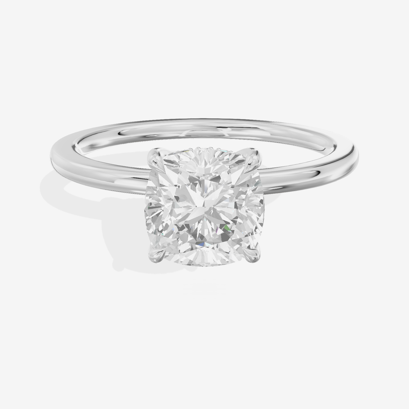 Coeurine Hidden Halo Cushion Engagement Ring (1/20 ct. tw.) in Platinum