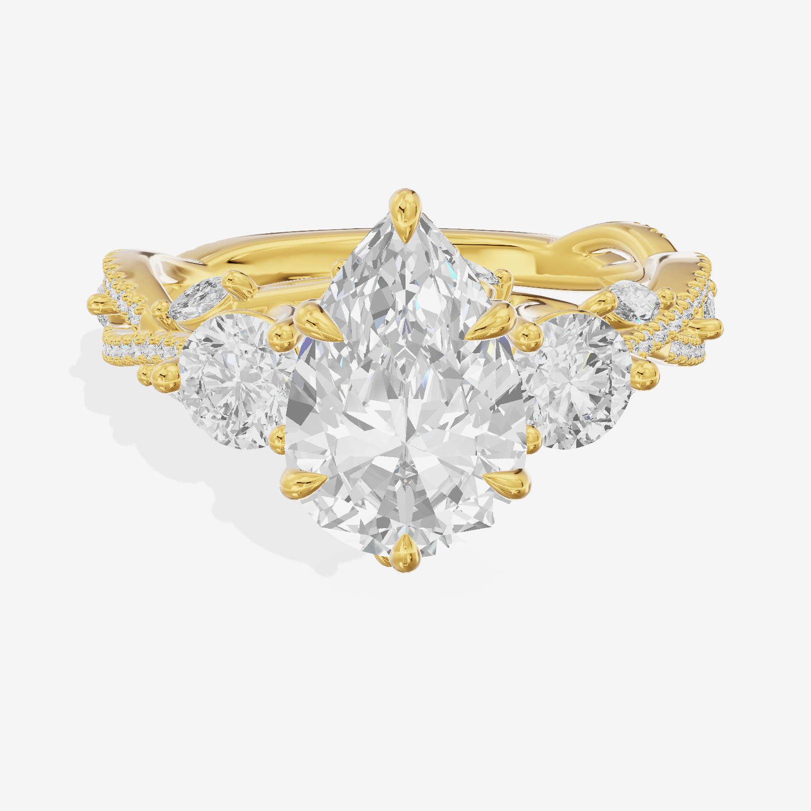 Classic Coeurine Three Stone Pear Engagement Ring (3/5 ct. tw.) in 14K Yellow Gold