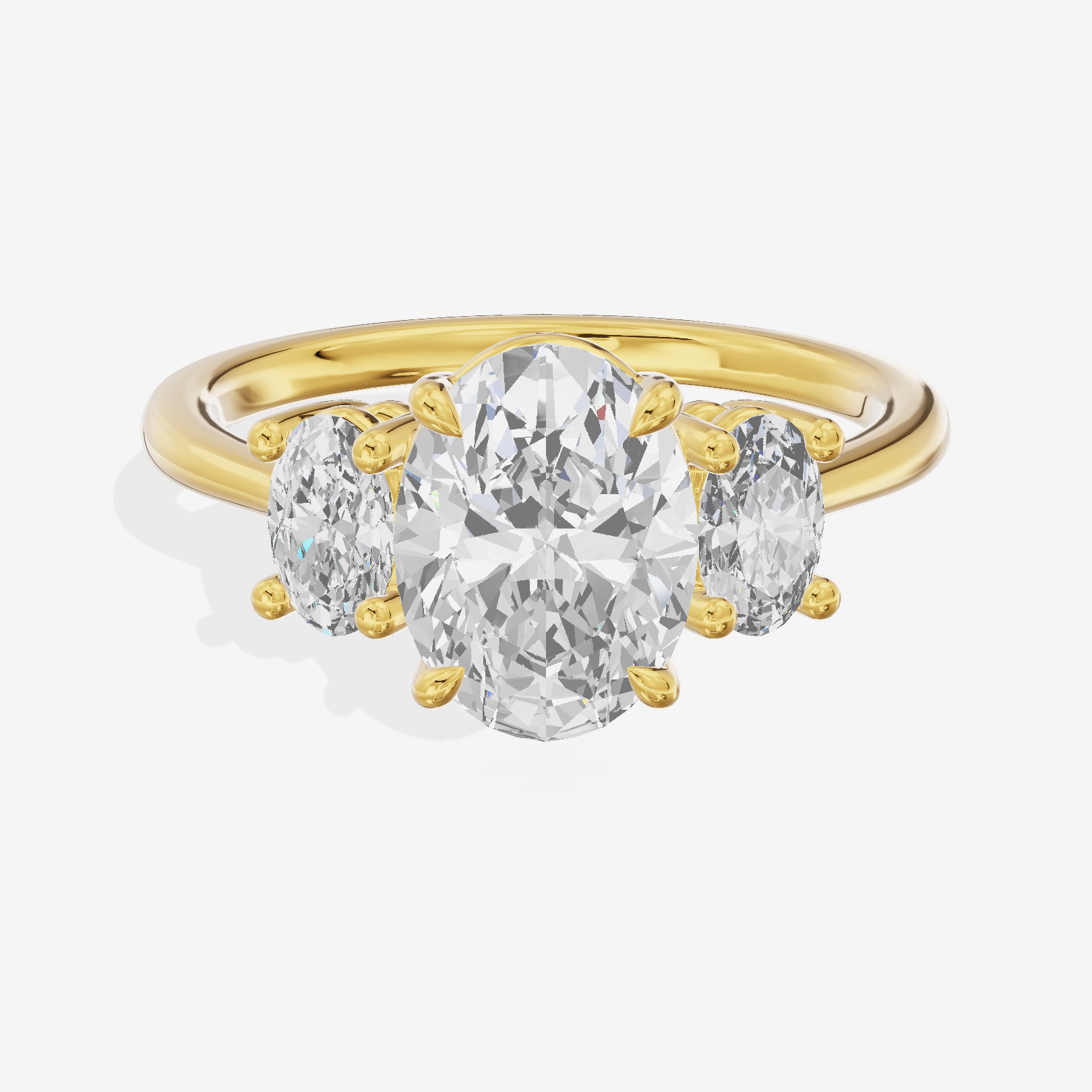 Modern Coeurine Three Stone Oval Engagement Ring (1/2 ct. tw.) in 18K Yellow Gold