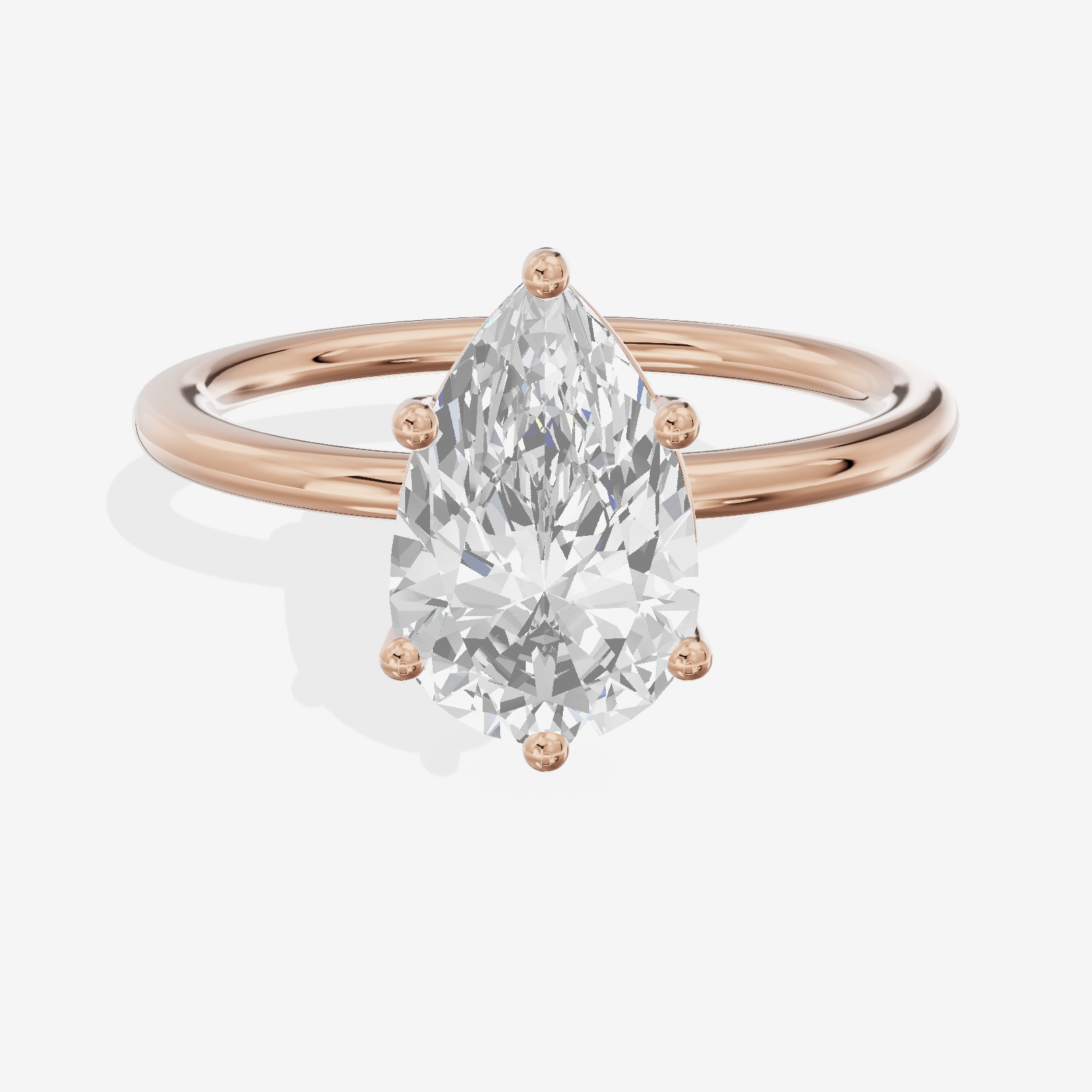Crowned Vowsae 1.5mm Pear Solitaire Engagement Ring in 18K Rose Gold