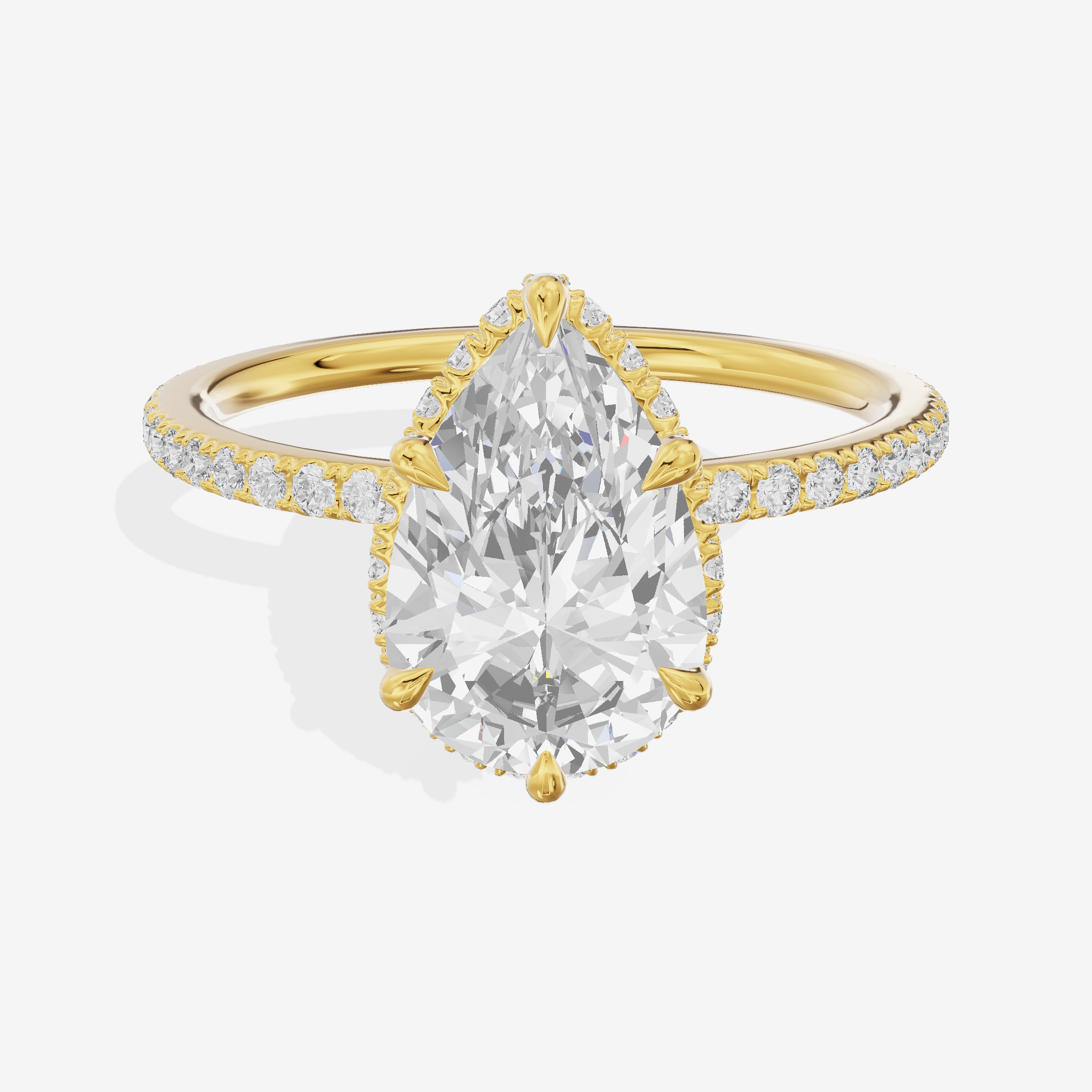 Crowned Whisper Pear Hidden Halo Engagement Ring in 14K Yellow Gold