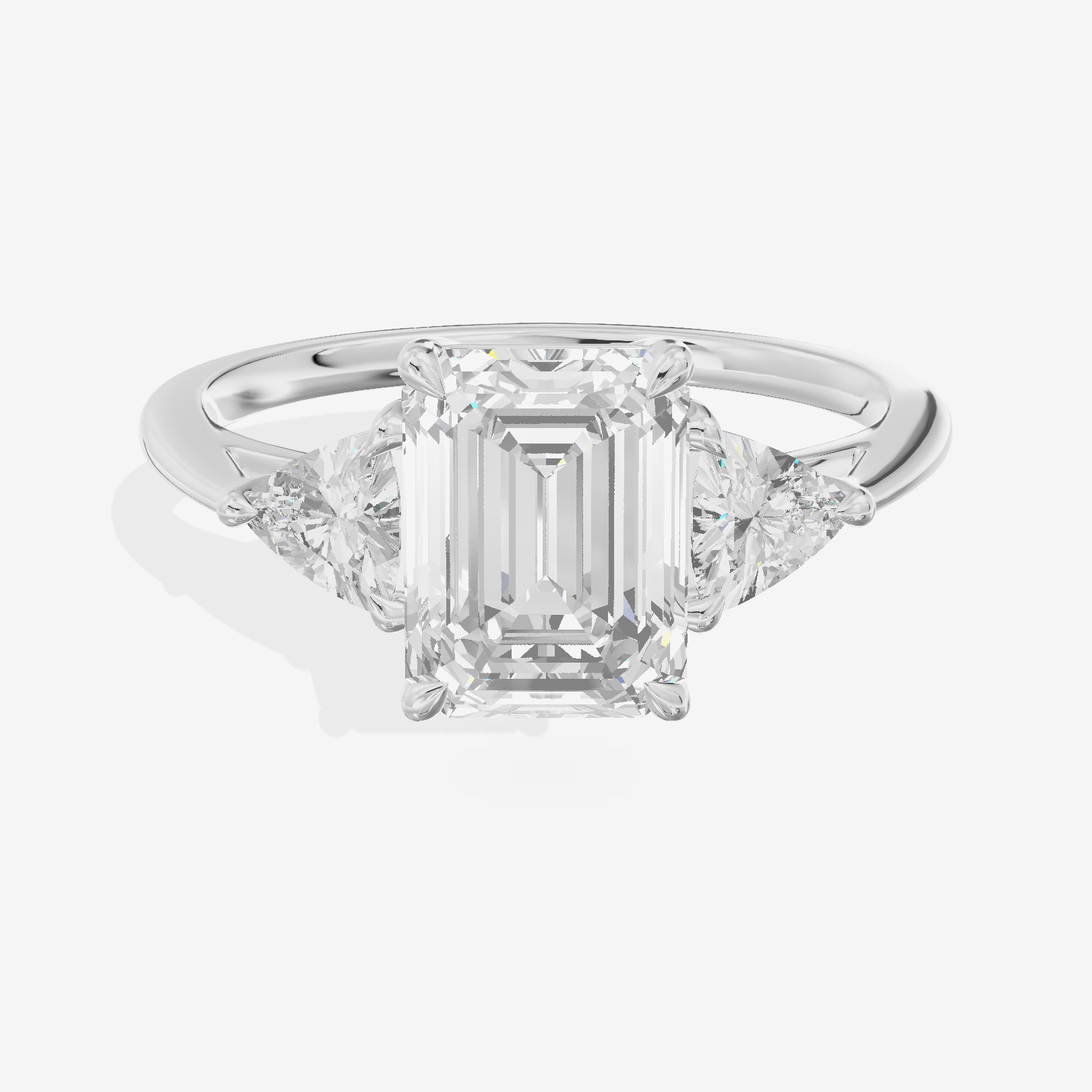 Coeurine Three Stone Emerald Engagement Ring (1/8 ct. tw.) in 18K White Gold