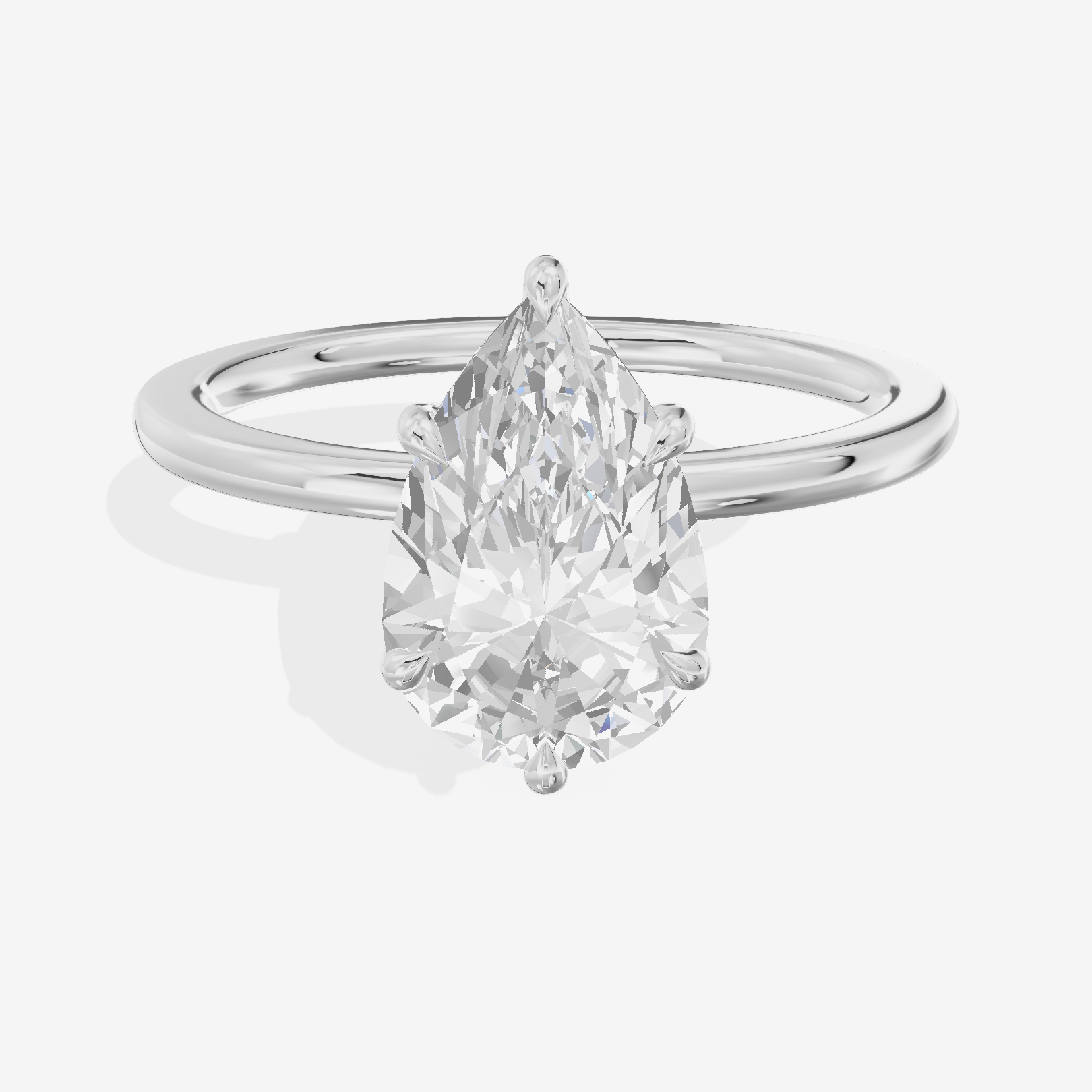 Coeurine Hidden Halo Pear Engagement Ring (1/20 ct. tw.) in 14K White Gold