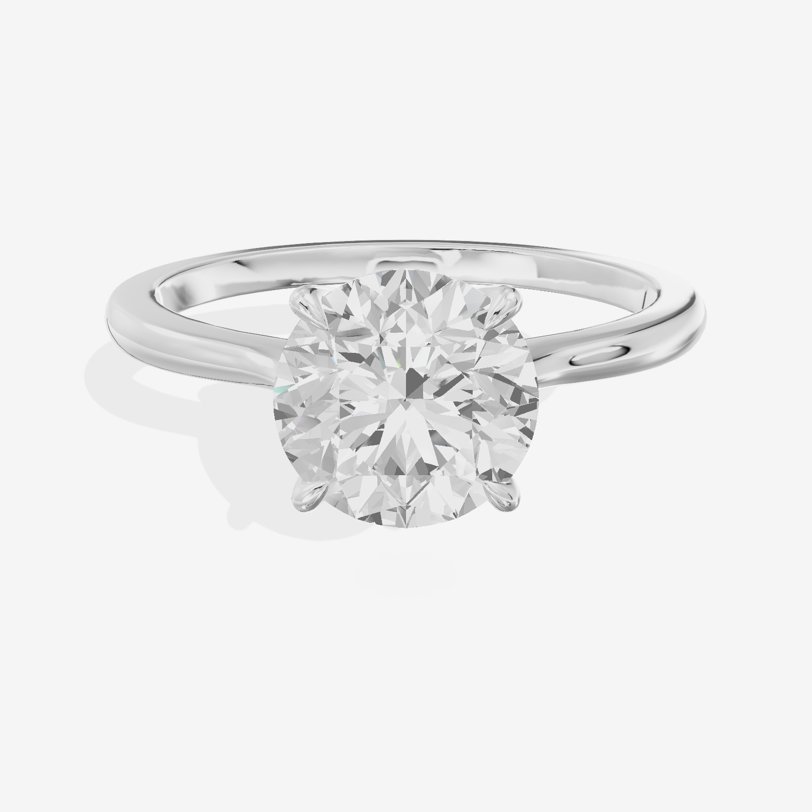 Bowed Adorae 1.5mm Round Solitaire Engagement Ring in 18K White Gold