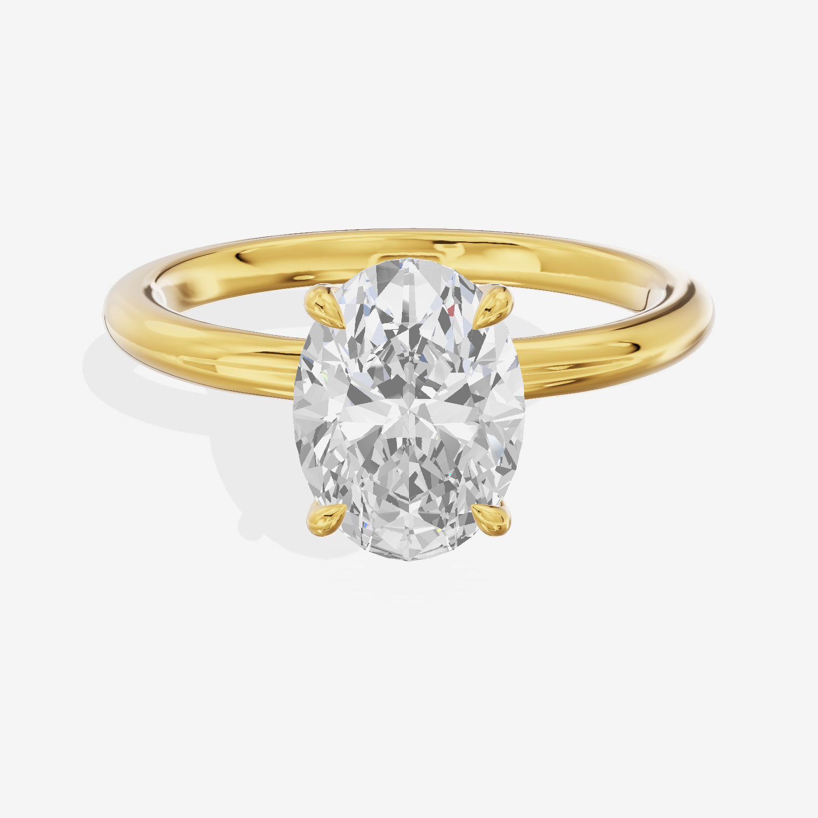 Adorae Solitaire 2mm Oval Engagement Ring in 14K Yellow Gold