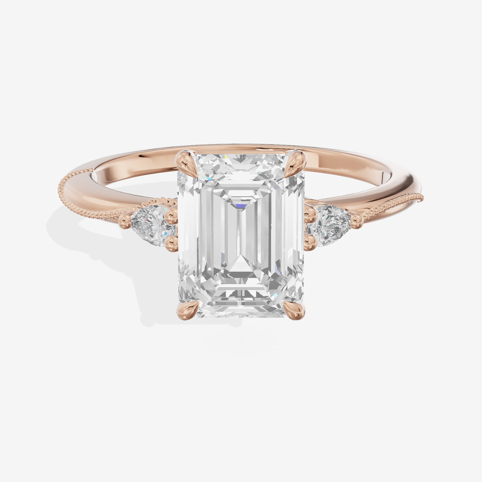 Promezza Three Stone Emerald Engagement Ring (1/10 ct. tw.) in 14K Rose Gold