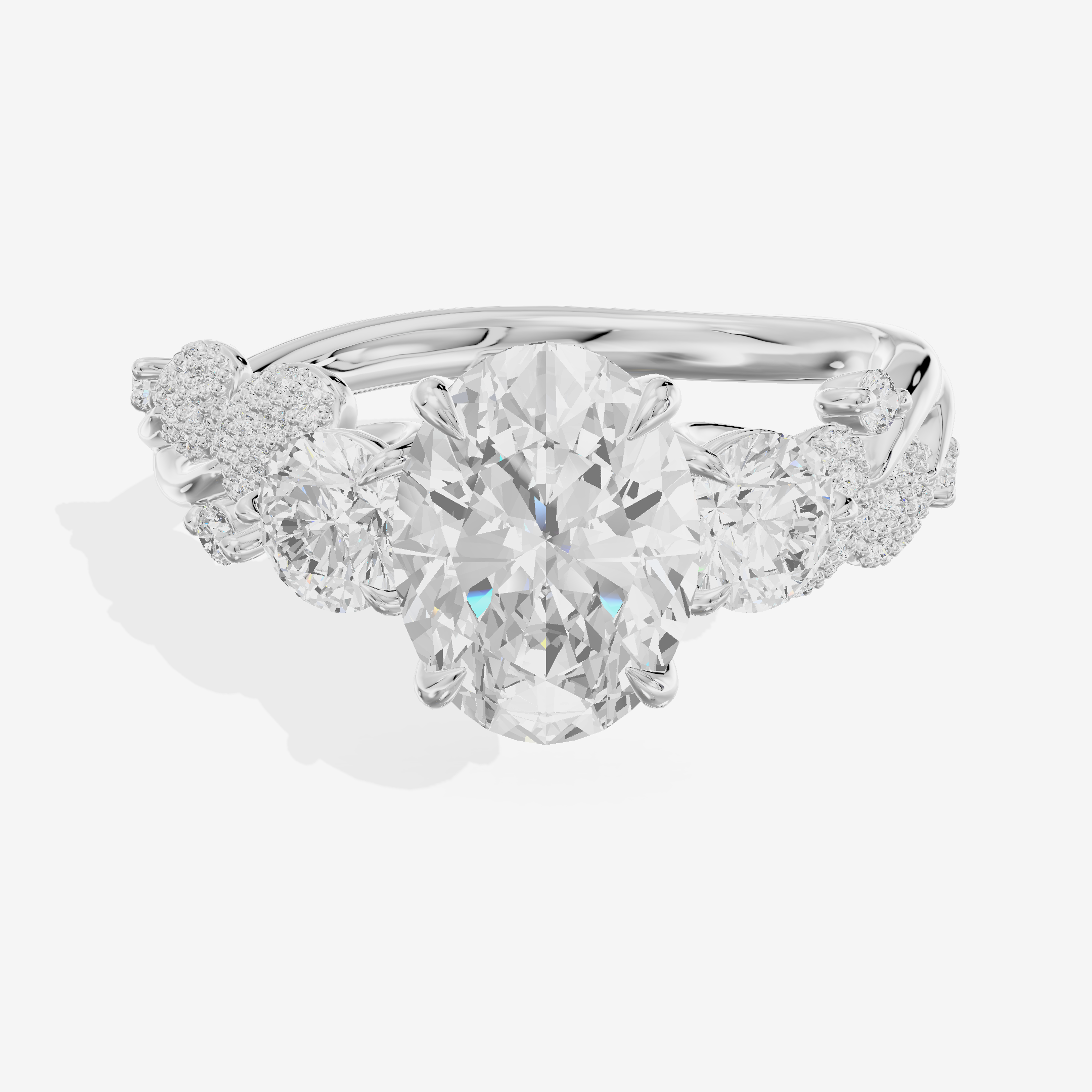 Modern Coeurine Three Stone Oval Engagement Ring (1/2 ct. tw.) in 18K White Gold