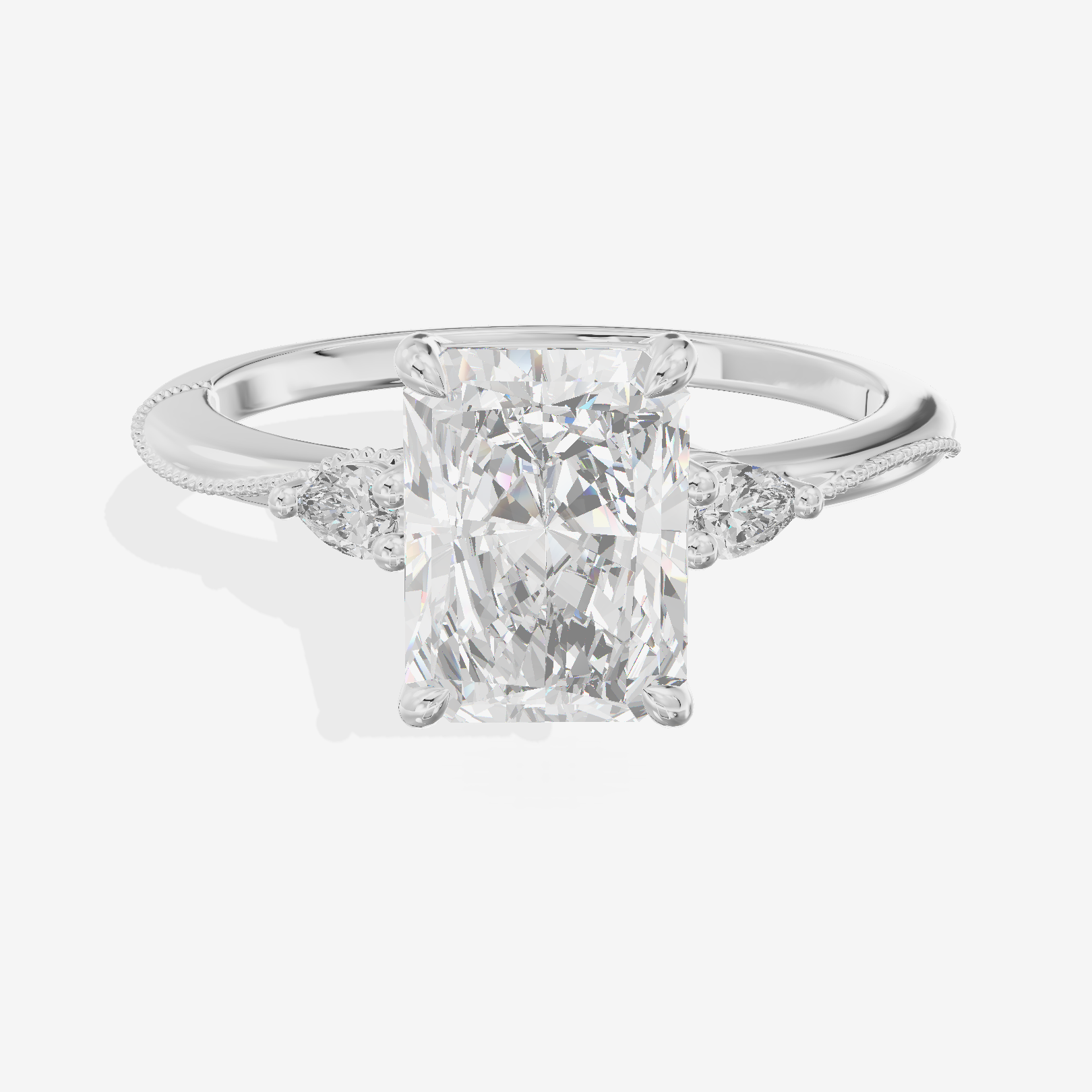 Promezza Three Stone Radiant Engagement Ring (1/10 ct. tw.) in 18K White Gold