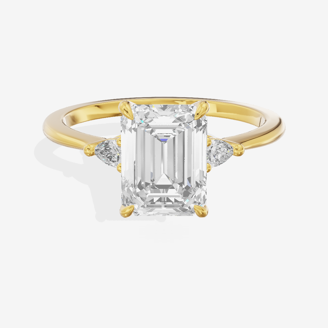 Coeurine Three Stone Emerald Engagement Ring (1/8 ct. tw.) in 14K Yellow Gold