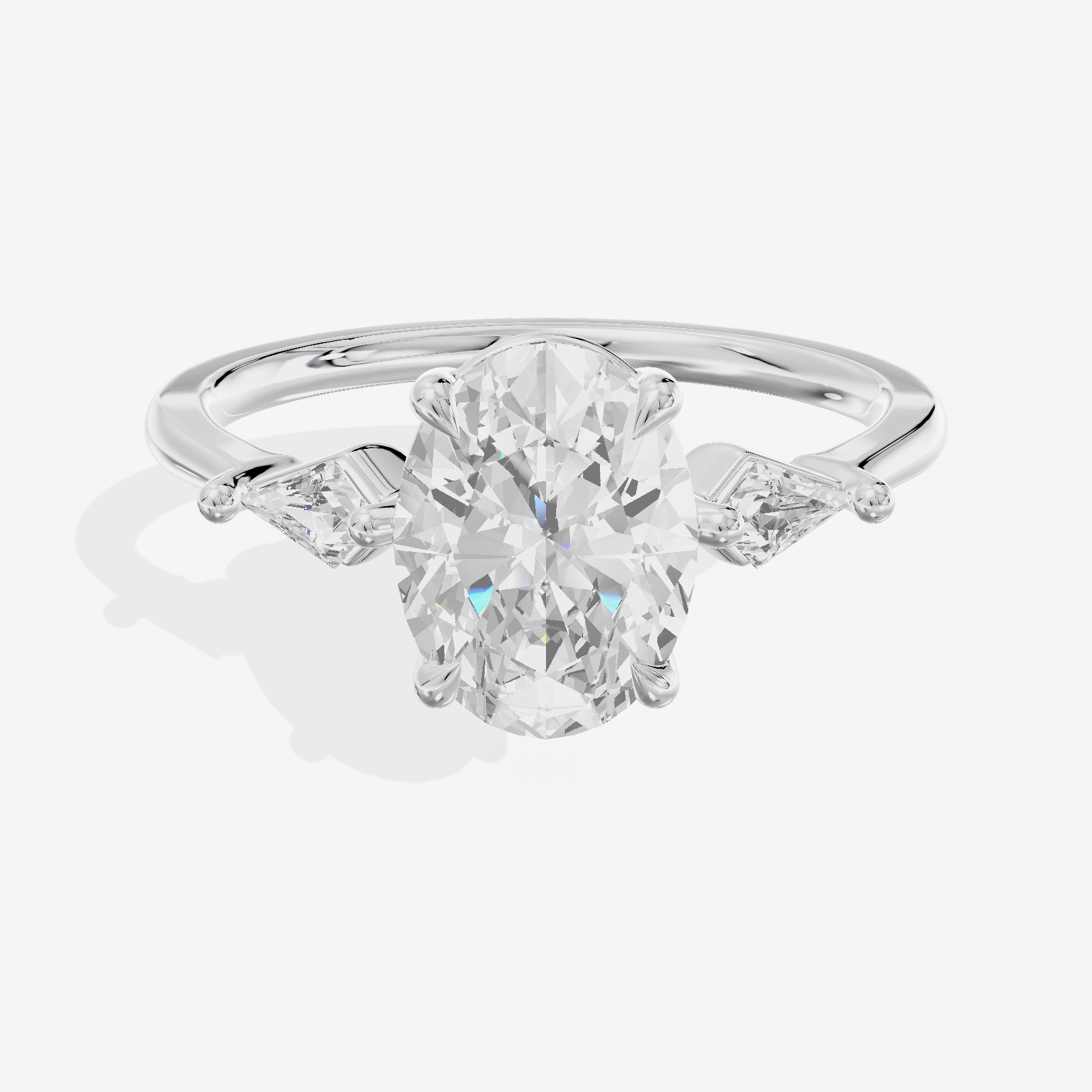 Whispered Triade Oval Three Stone Engagement Ring (1/10 ct. tw.) in 18K White Gold