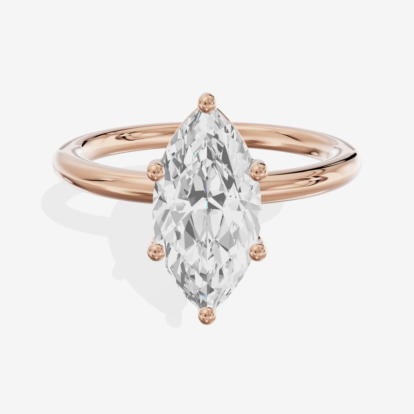 Tender 2mm Marquise Solitaire Engagement Ring in 14K Rose Gold