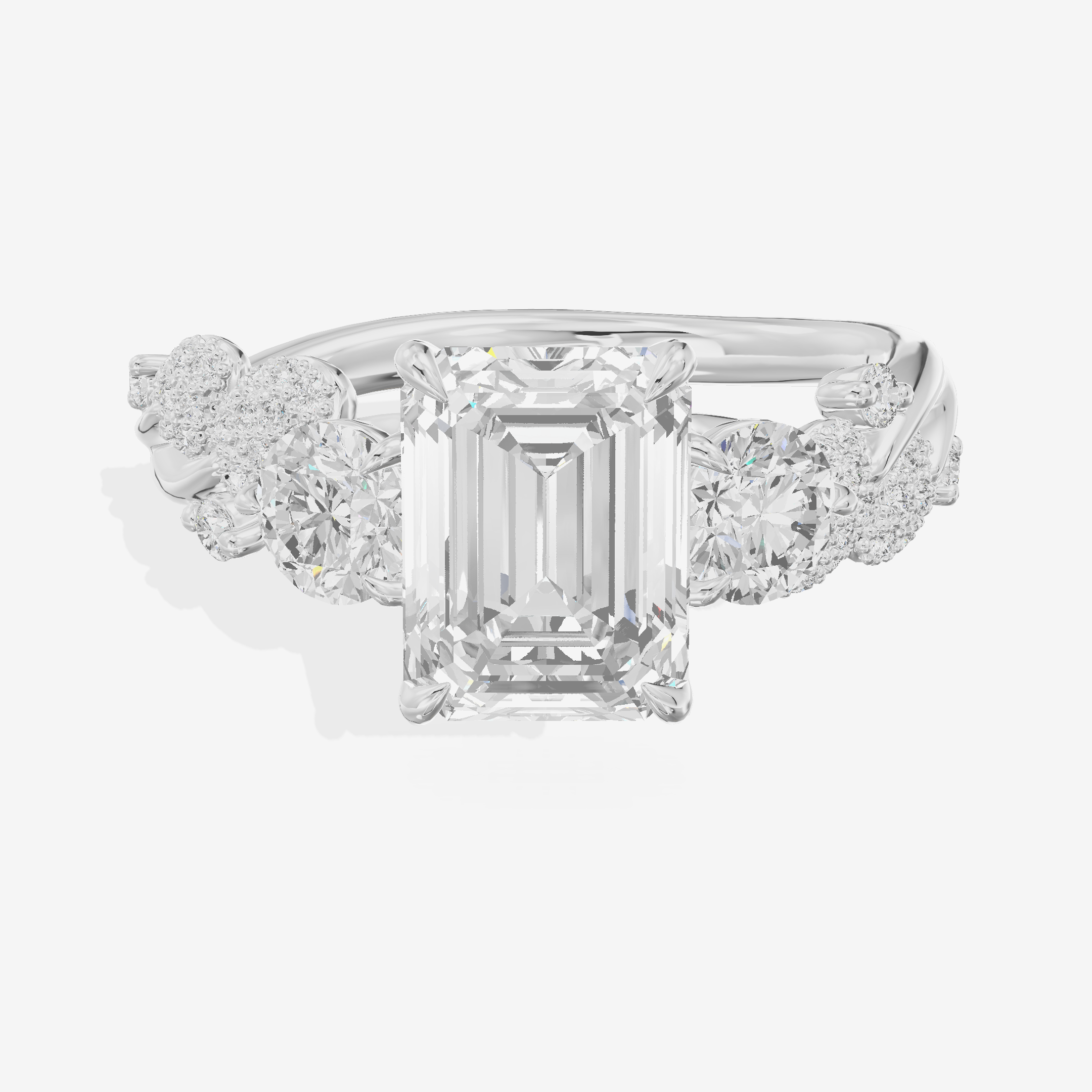 Modern Coeurine Three Stone Emerald Engagement Ring (1/2 ct. tw.) in Platinum