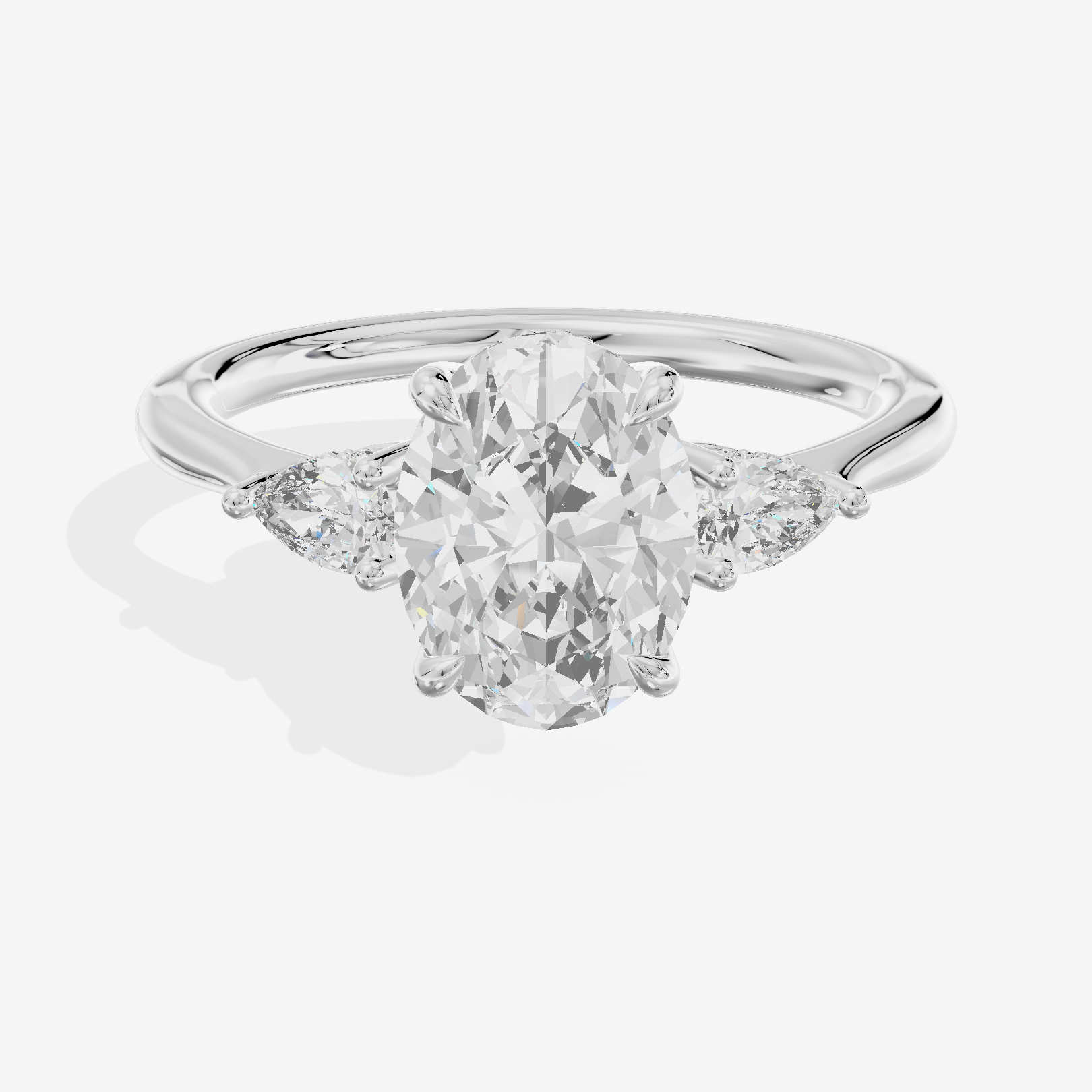 Petite Vowsae Three Stone Oval Engagement Ring (1/4 ct. tw.) in 18K White Gold
