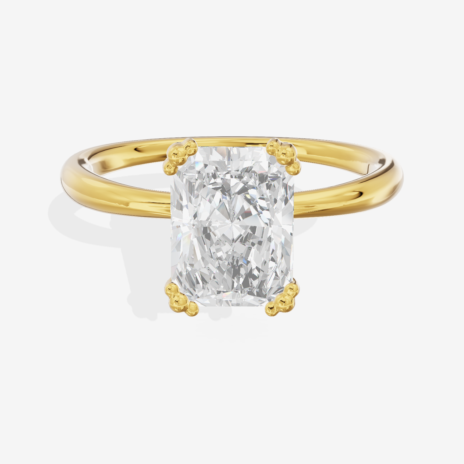 Classic Tender Radiant Solitaire Engagement Ring in 14K Yellow Gold