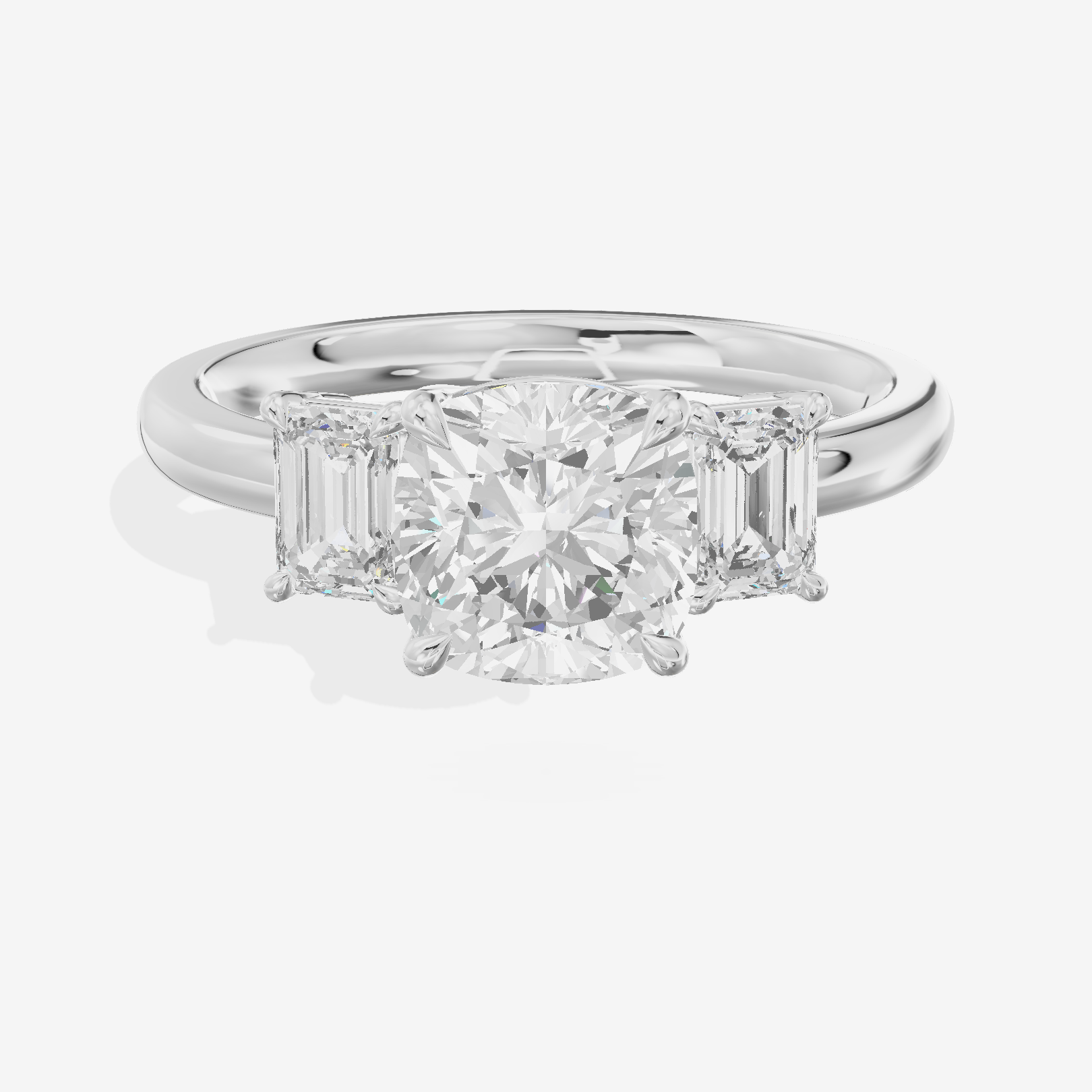 Petite Coeurine Three Stone Cushion Engagement Ring (1/5 ct. tw.) in Platinum