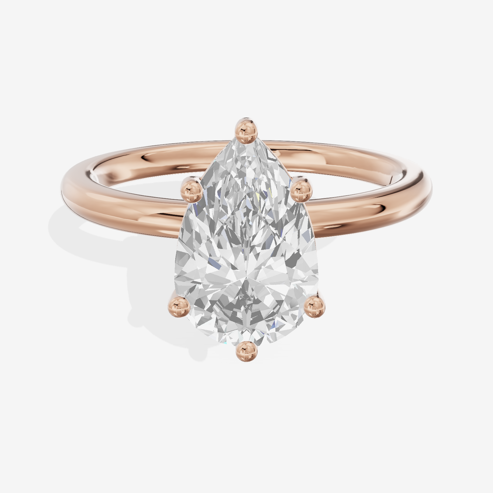 Tender 2mm Pear Solitaire Engagement Ring in 18K Rose Gold