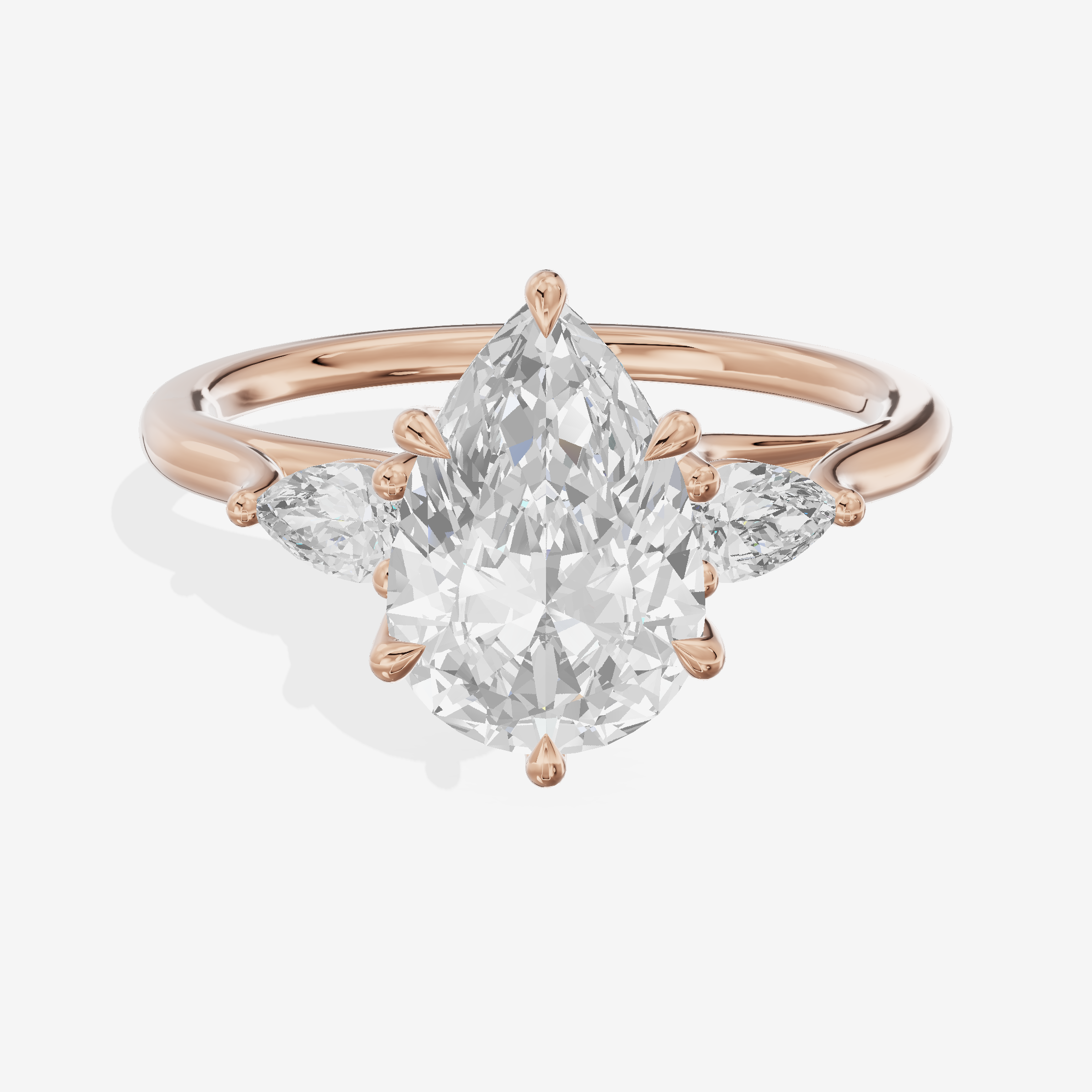 Classic Belovae Pear Three Stone Engagement Ring (1/5 ct. tw.) in 14K Rose Gold
