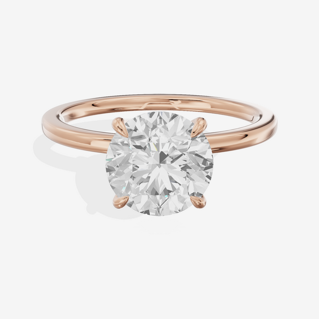 Sincere Halo Round Engagement Ring (1/15 ct. tw.) in 14K Rose Gold