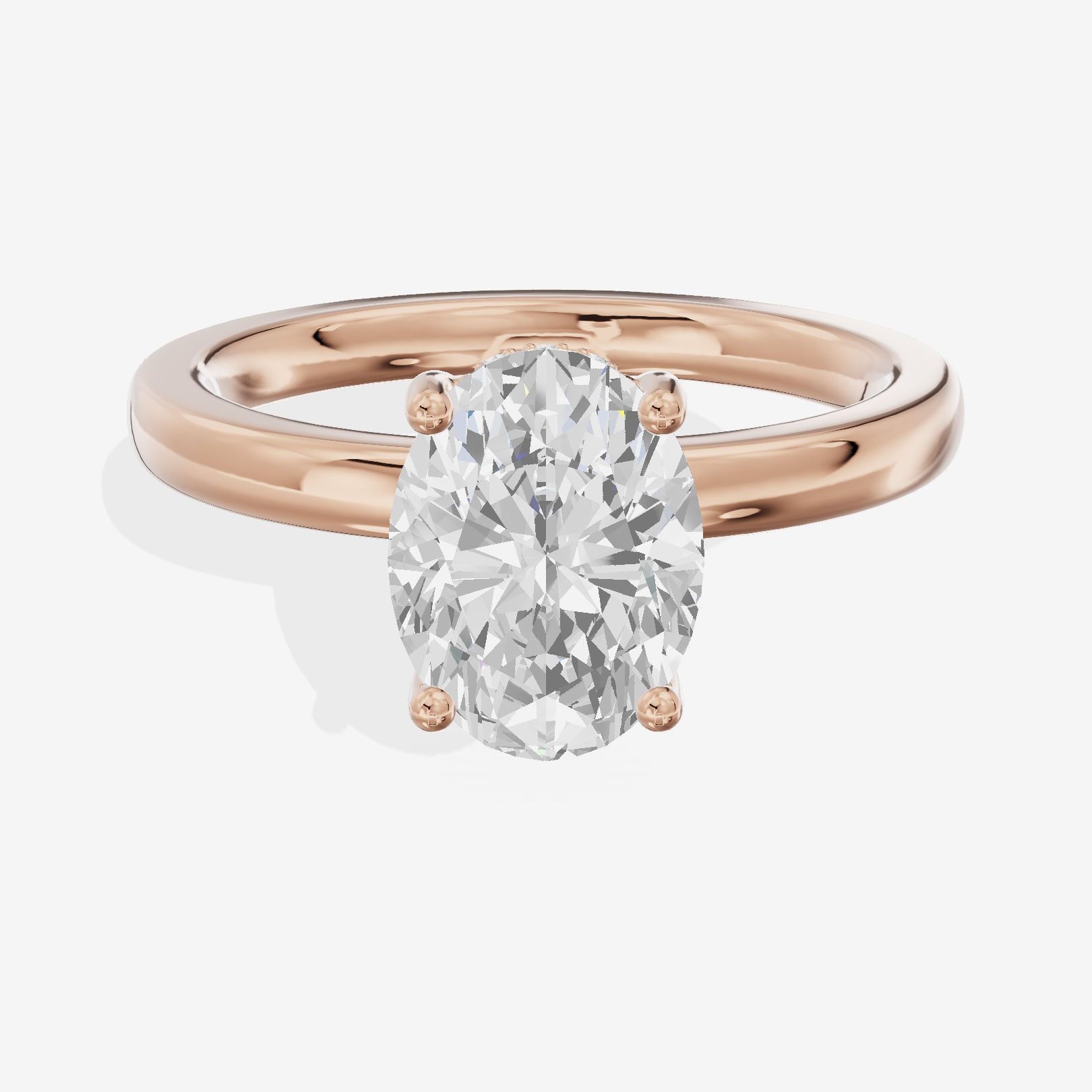 Reverya Oval Hidden Halo Engagement Ring (1/15 ct. tw.) in 18K Rose Gold