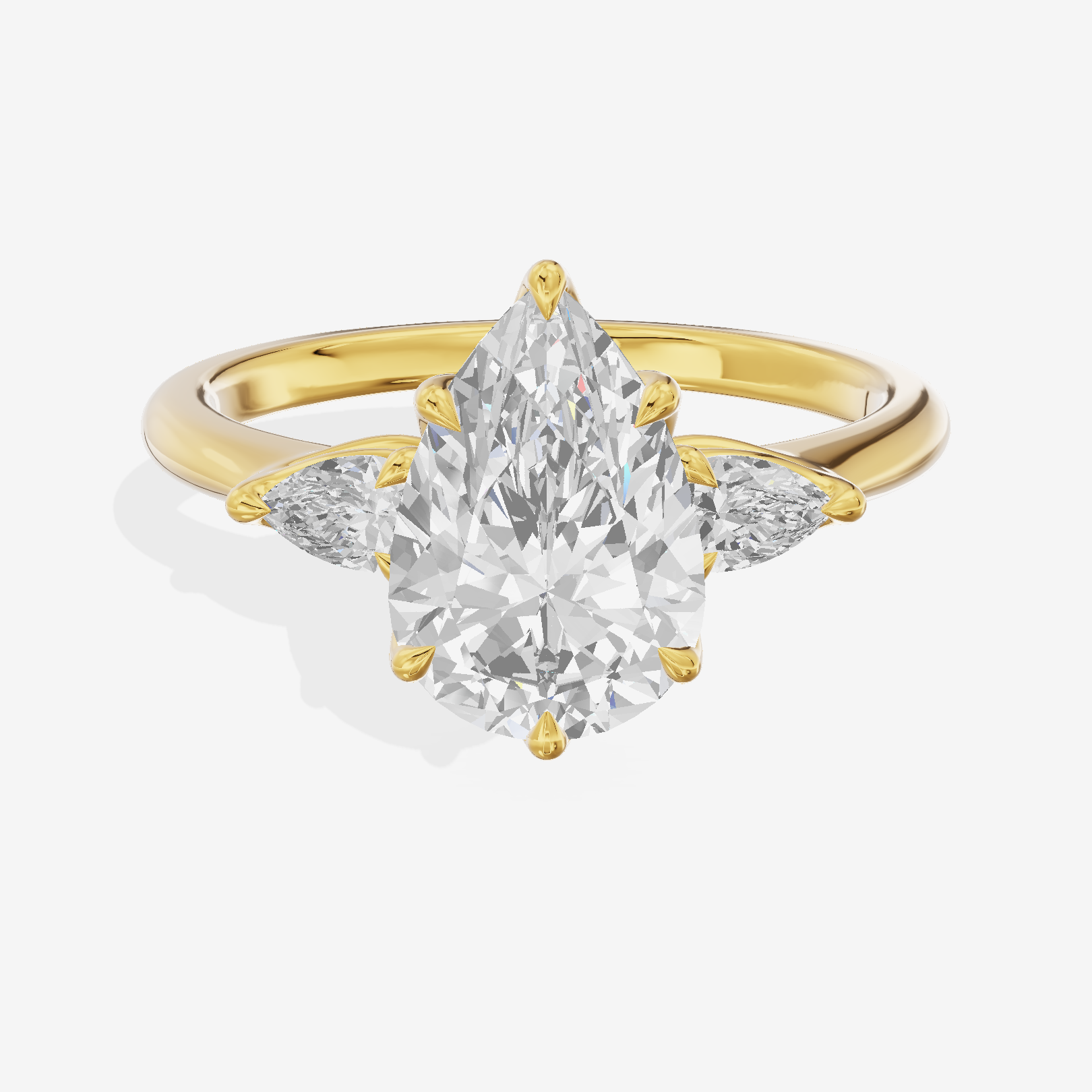 Petite Coeurine Three Stone Pear Engagement Ring (1/5 ct. tw.) in 14K Yellow Gold