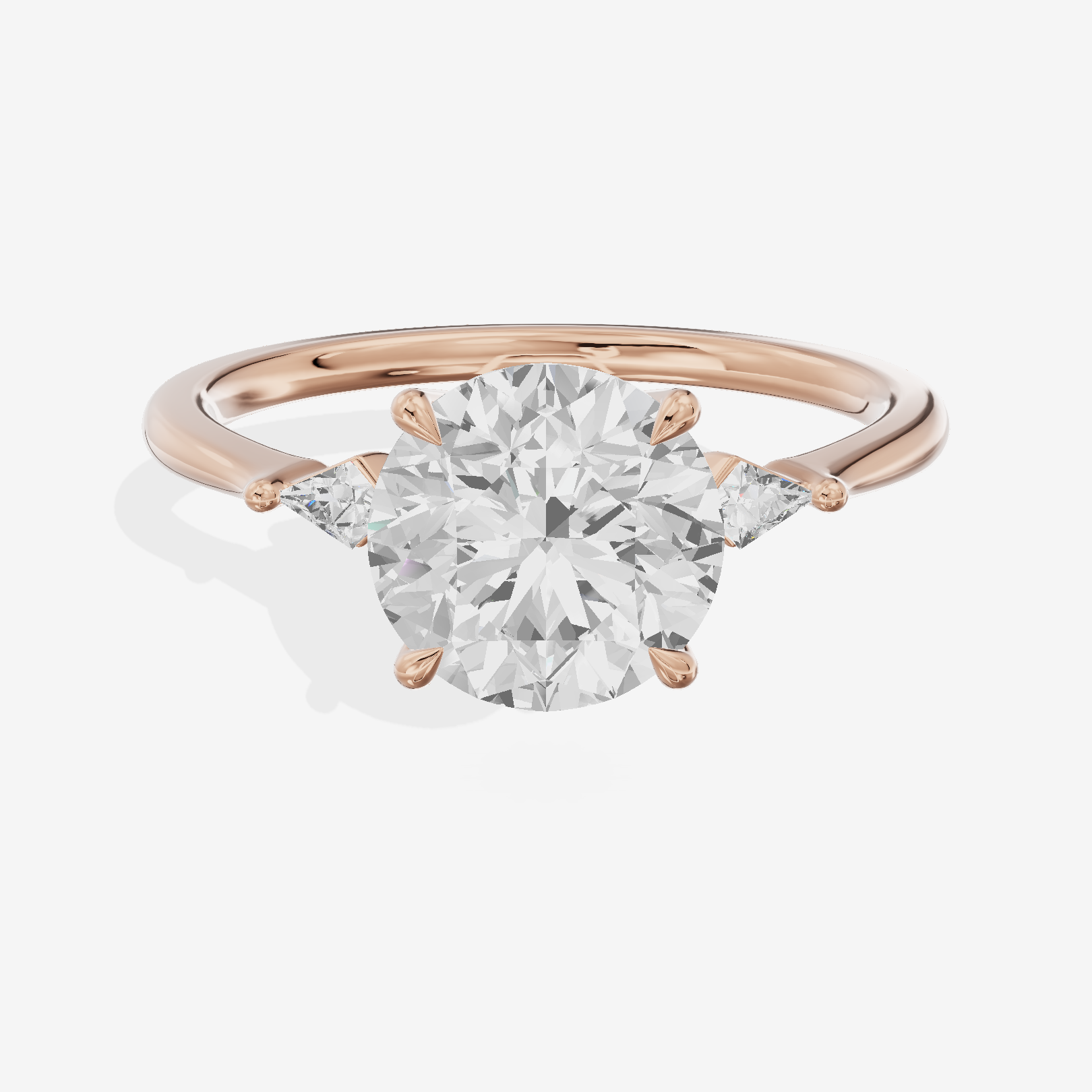Petite Triade Round Three Stone Engagement Ring (1/15 ct. tw.) in 14K Rose Gold