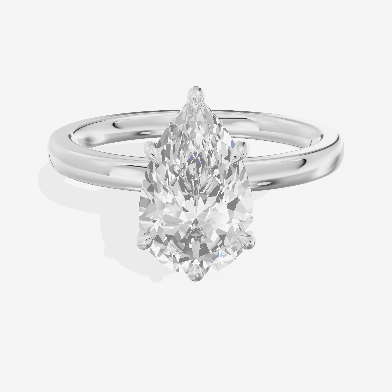 Crowned Whisper Pear Hidden Halo Engagement Ring in Platinum