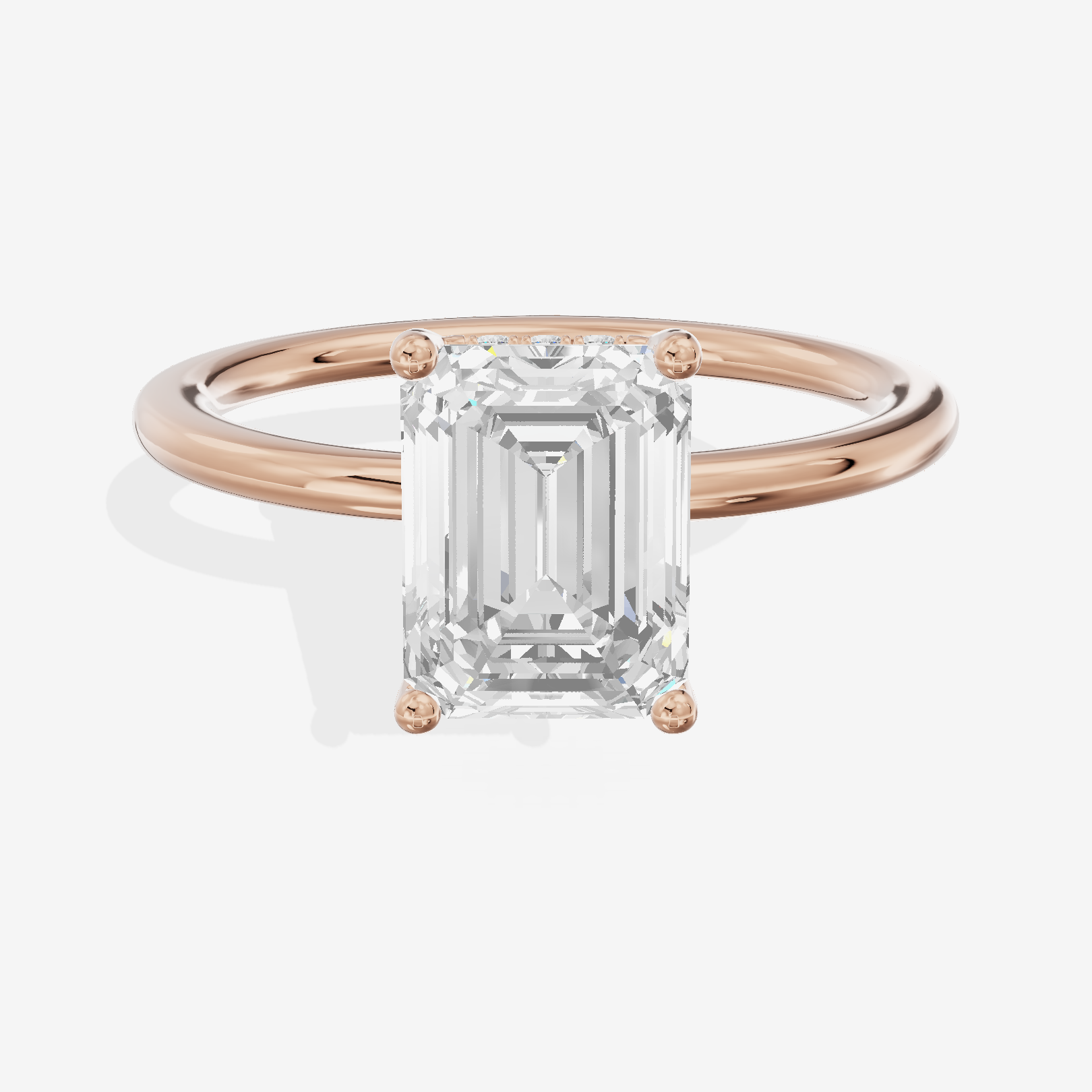 Reverya Hidden Halo Emerald Engagement Ring (1/20 ct. tw.) in 18K Rose Gold
