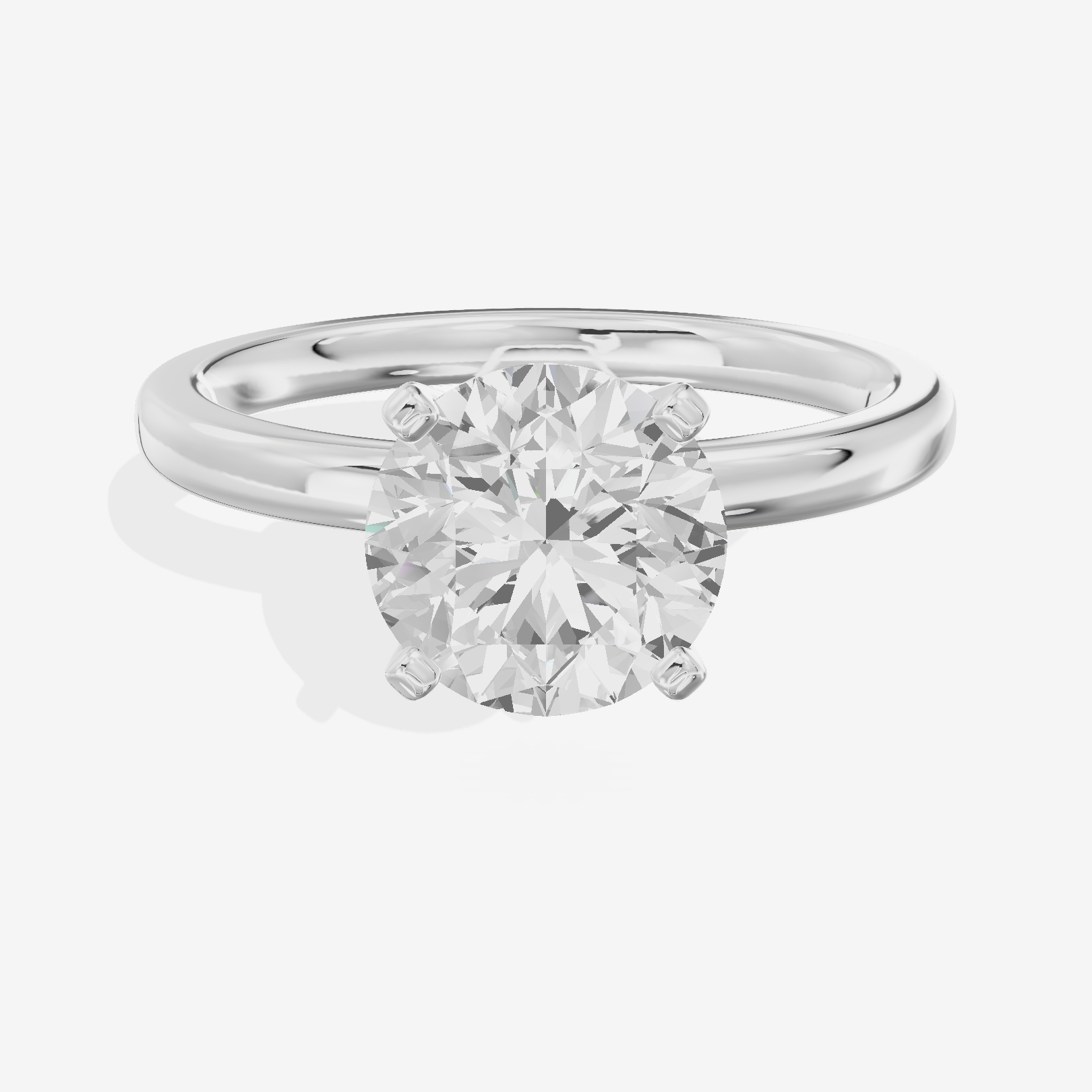 Sincere 2mm Round Solitaire Engagement Ring in Platinum