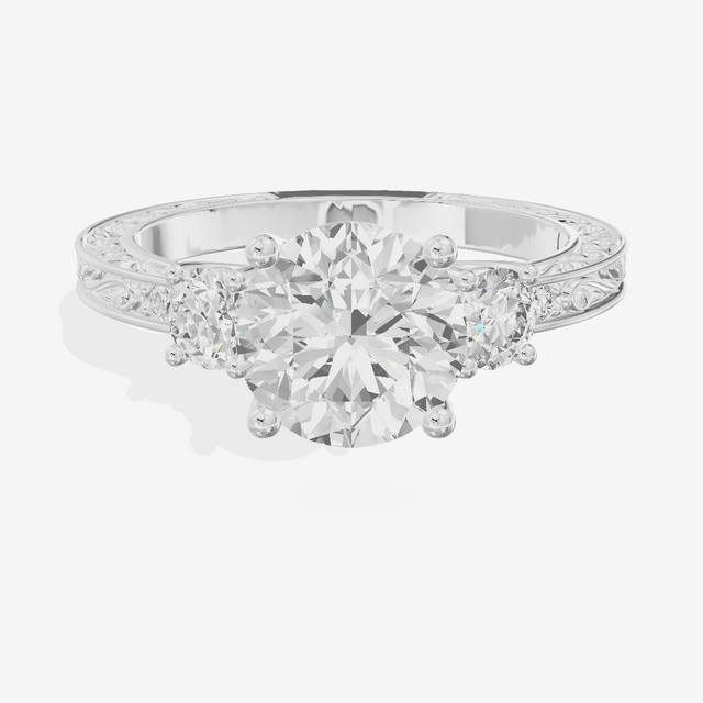 Triade Engraved Round Three Stone Engagement Ring (1/3 ct. tw.) in Platinum