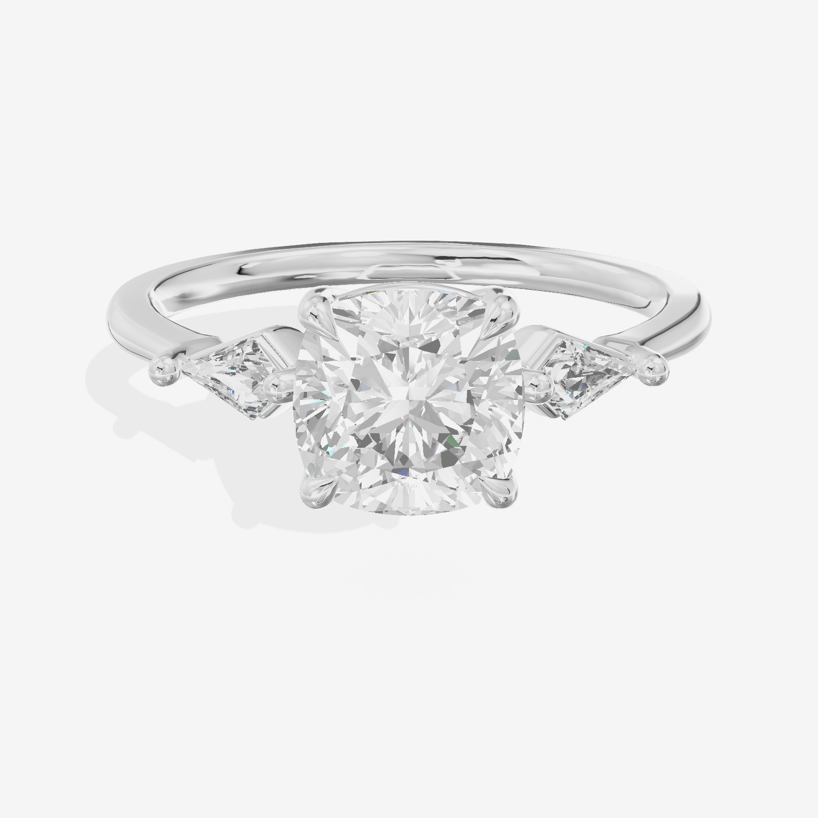 Whispered Triade Cushion Three Stone Engagement Ring (1/10 ct. tw.) in Platinum