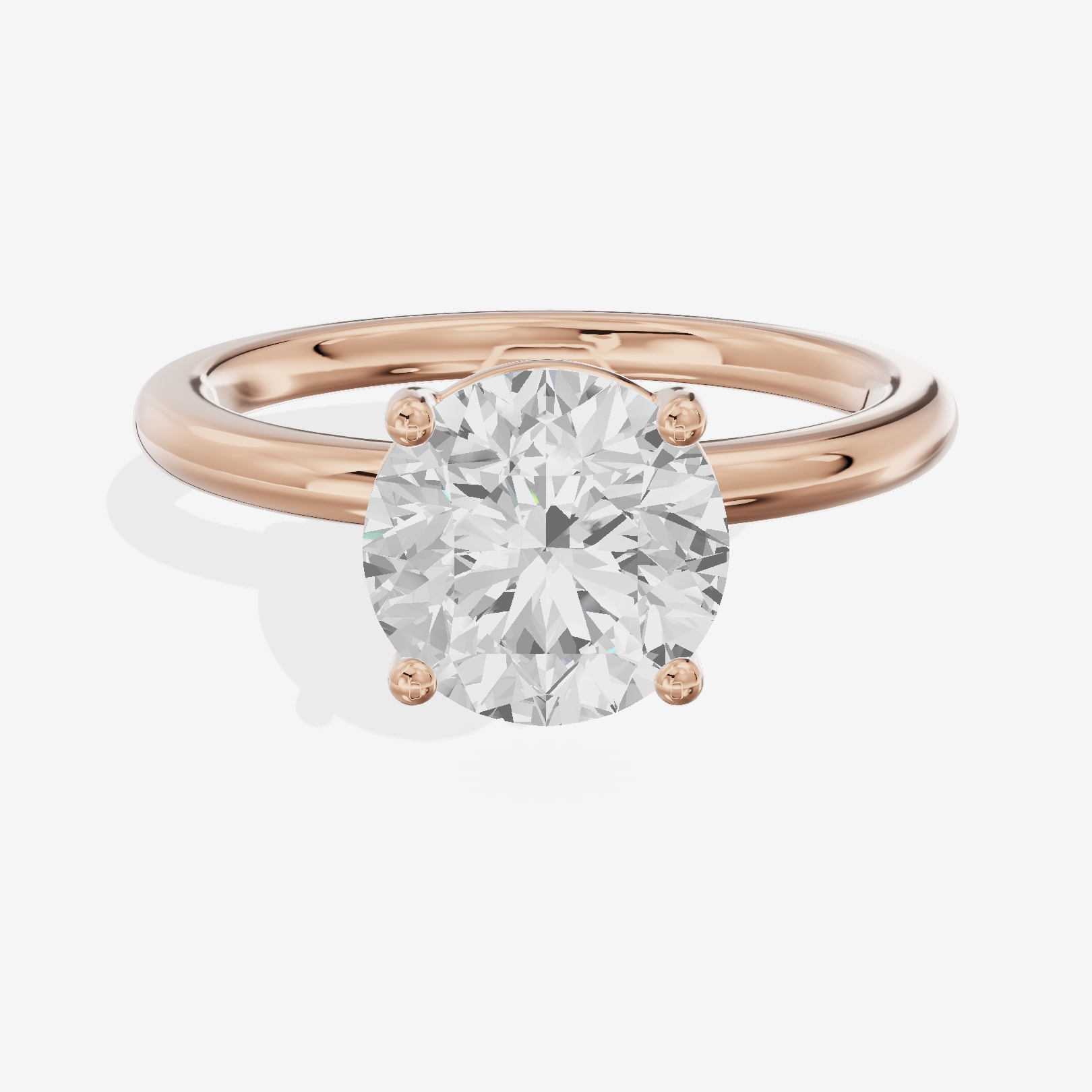 Tender 2mm Round Solitaire Engagement Ring in 18K Rose Gold