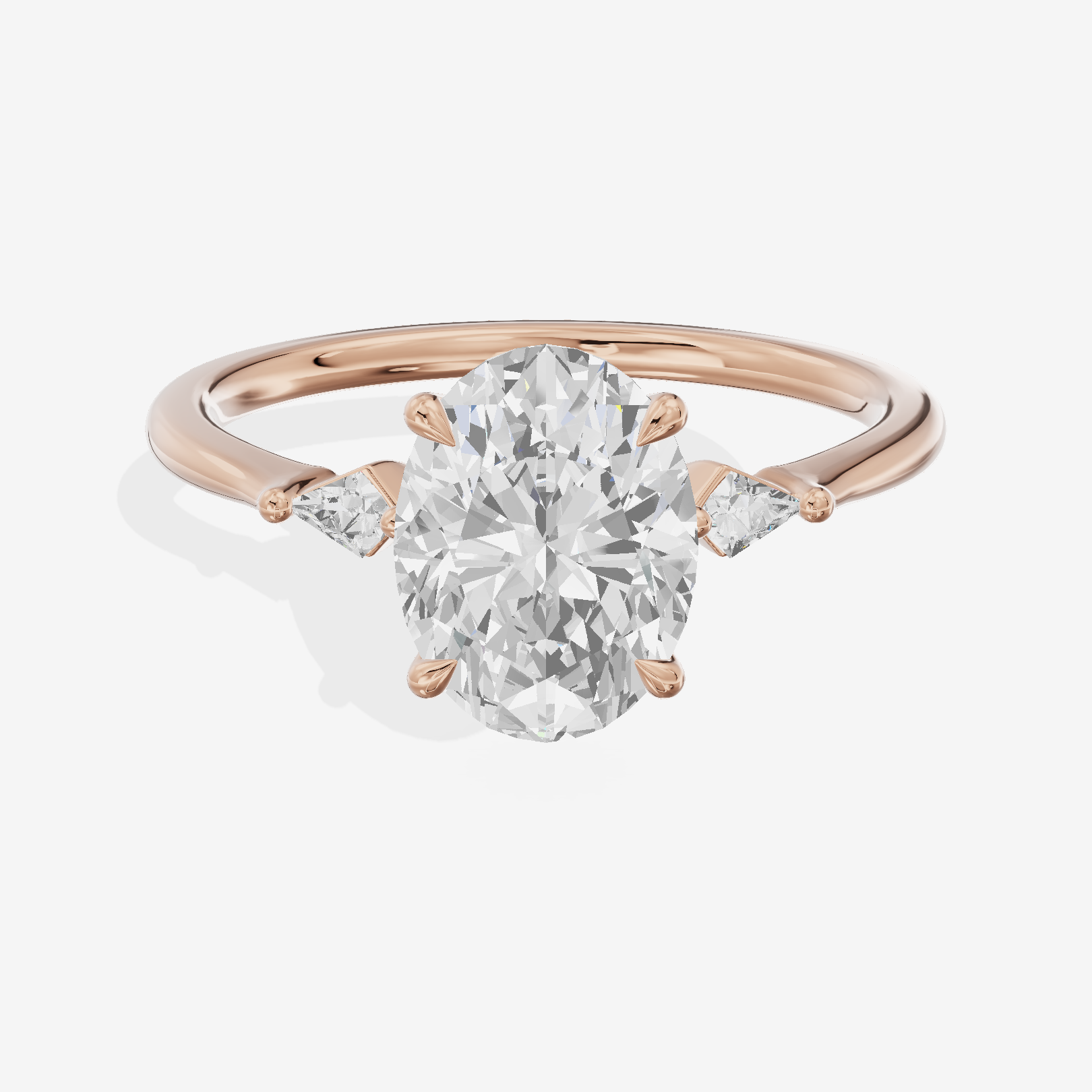 Petite Triade Oval Three Stone Engagement Ring (1/15 ct. tw.) in 18K Rose Gold