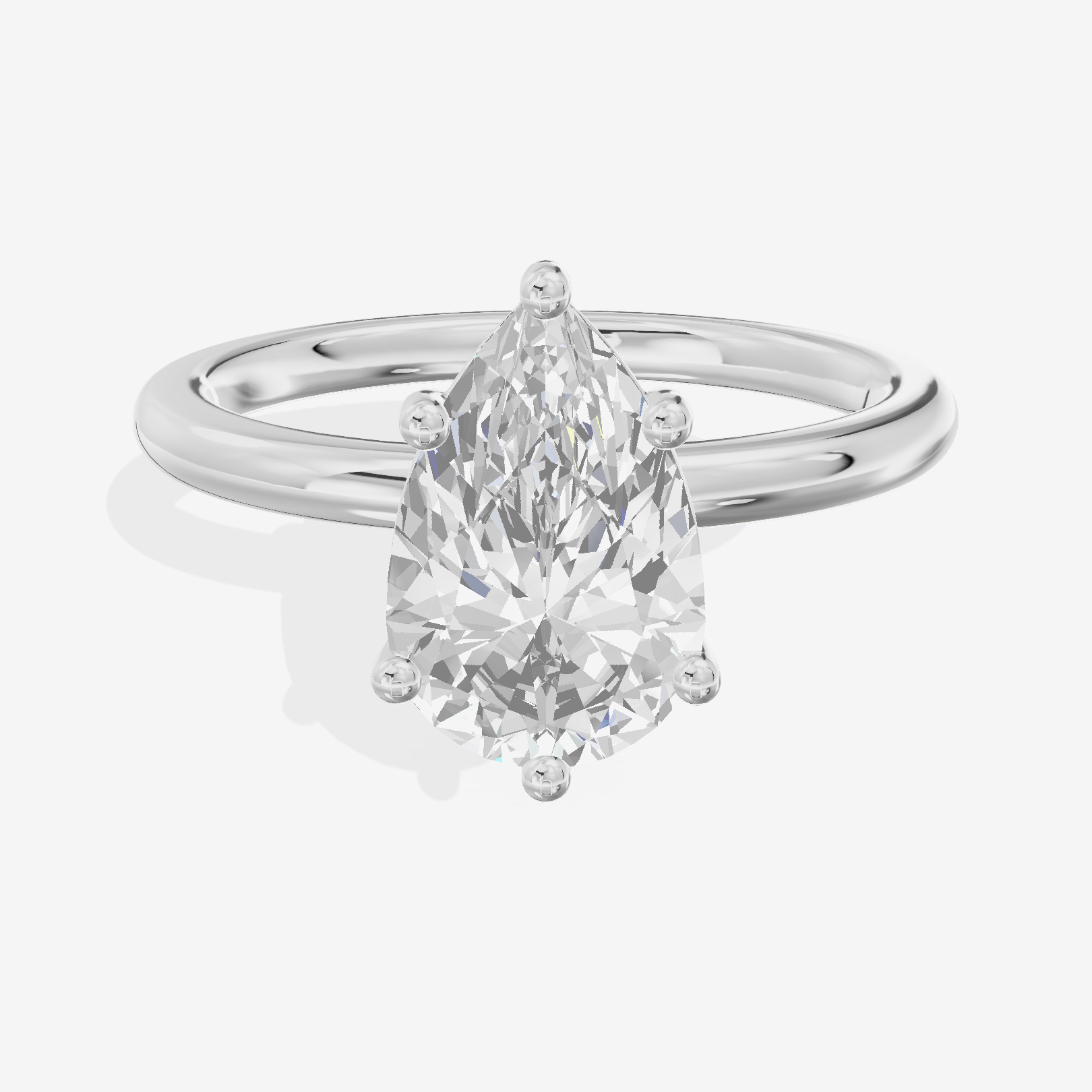 Tender 2mm Pear Solitaire Engagement Ring in 14K White Gold