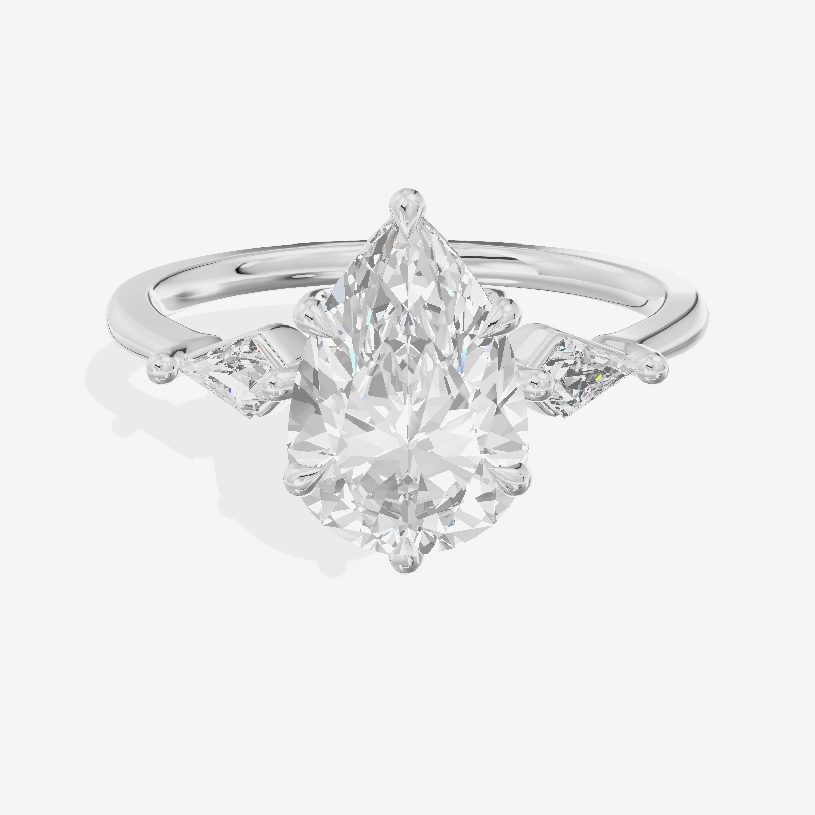 Whispered Triade Pear Three Stone Engagement Ring (1/10 ct. tw.) in Platinum
