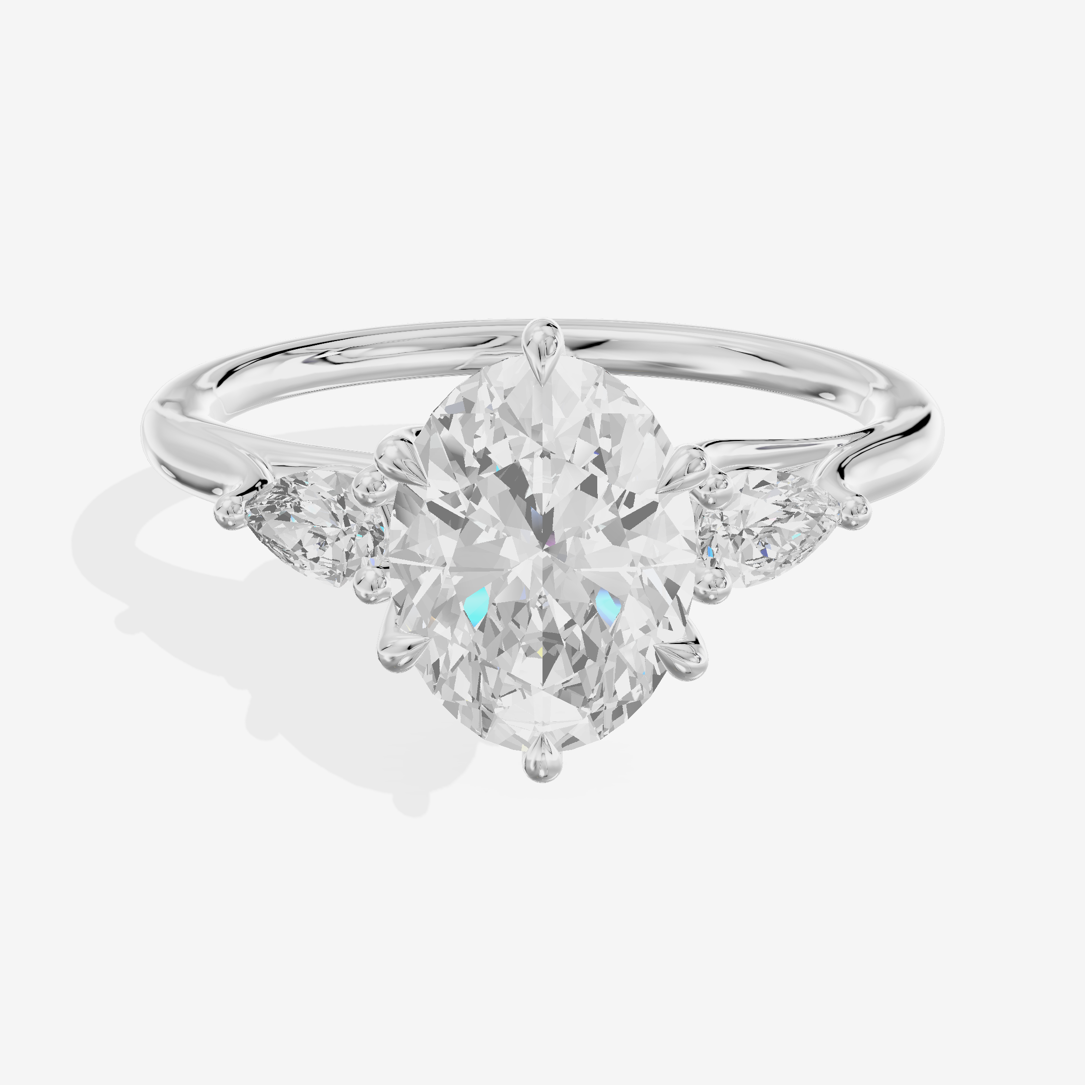 Classic Belovae Oval Three Stone Engagement Ring (1/5 ct. tw.) in Platinum