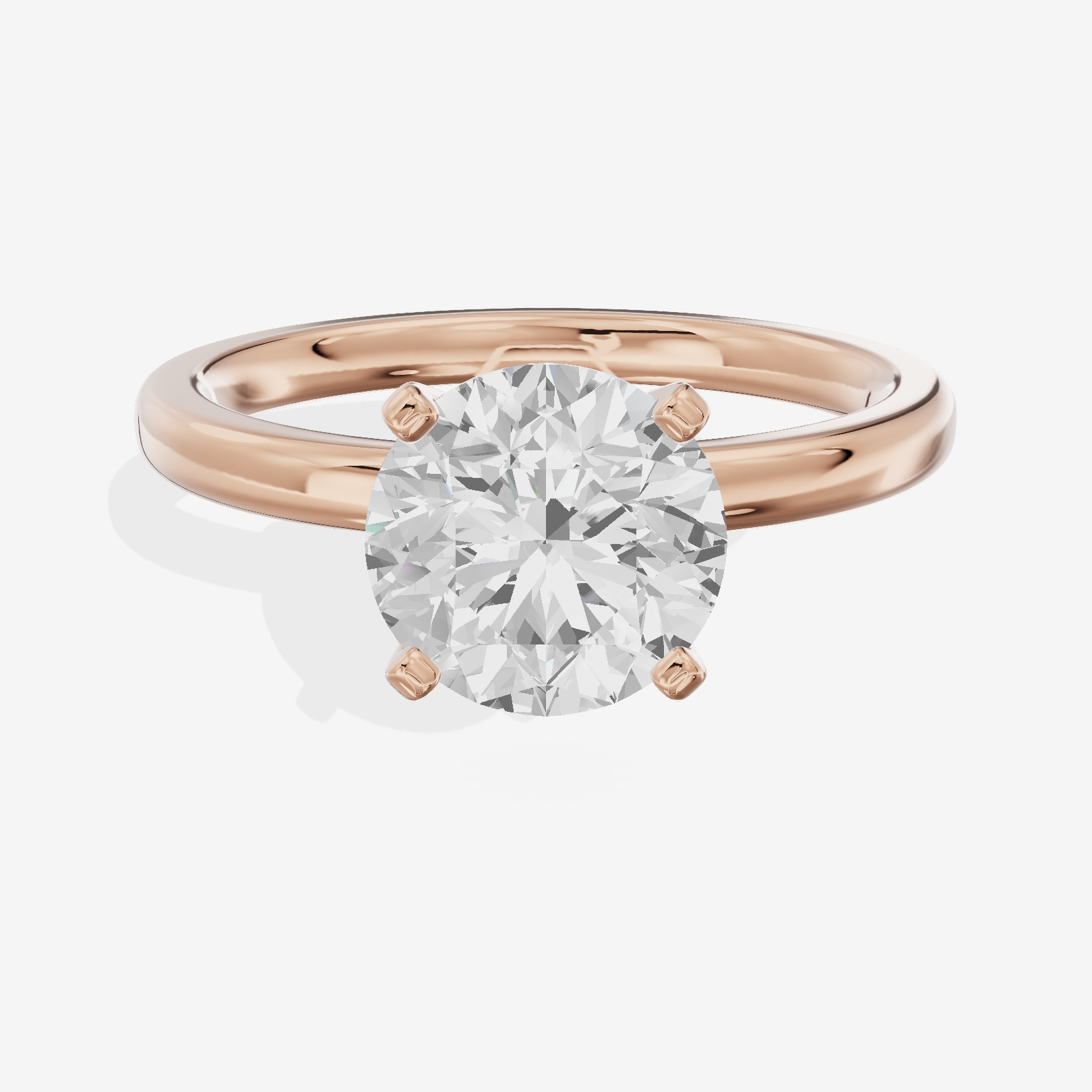 Sincere 2mm Round Solitaire Engagement Ring in 14K Rose Gold