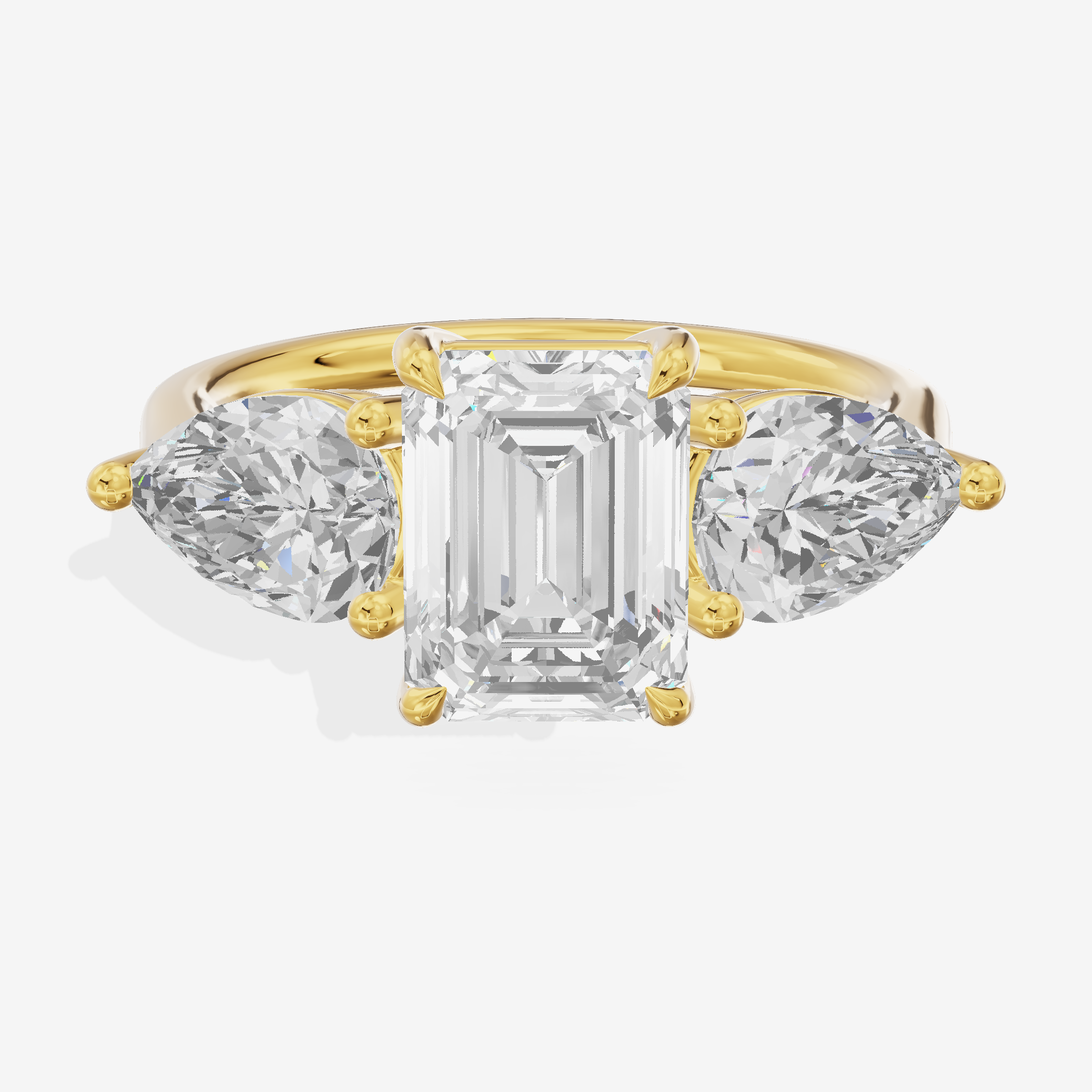 Luxe Heartline Three Stone Emerald Engagement Ring (3/4 ct. tw.) in 14K Yellow Gold